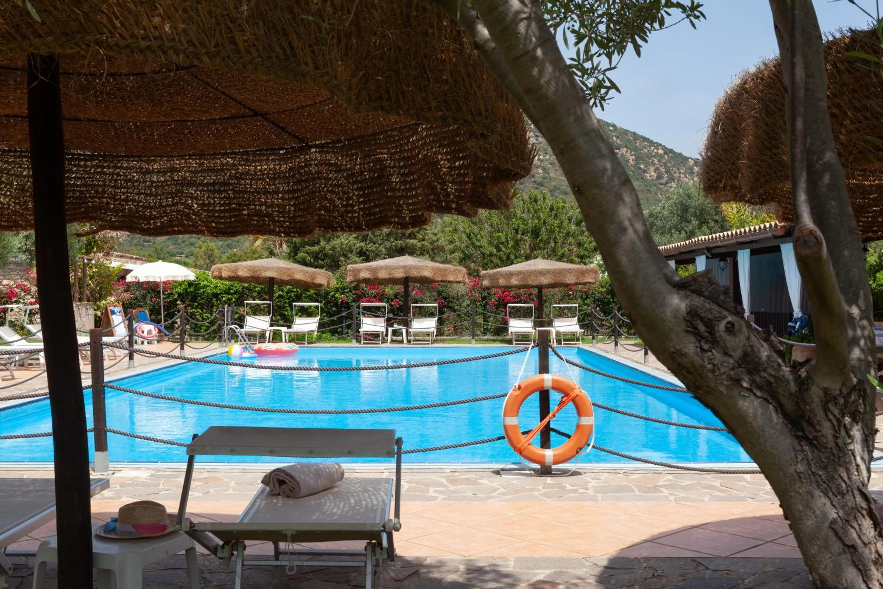 Swimming pool in iH Hotels Le Zagare Resort