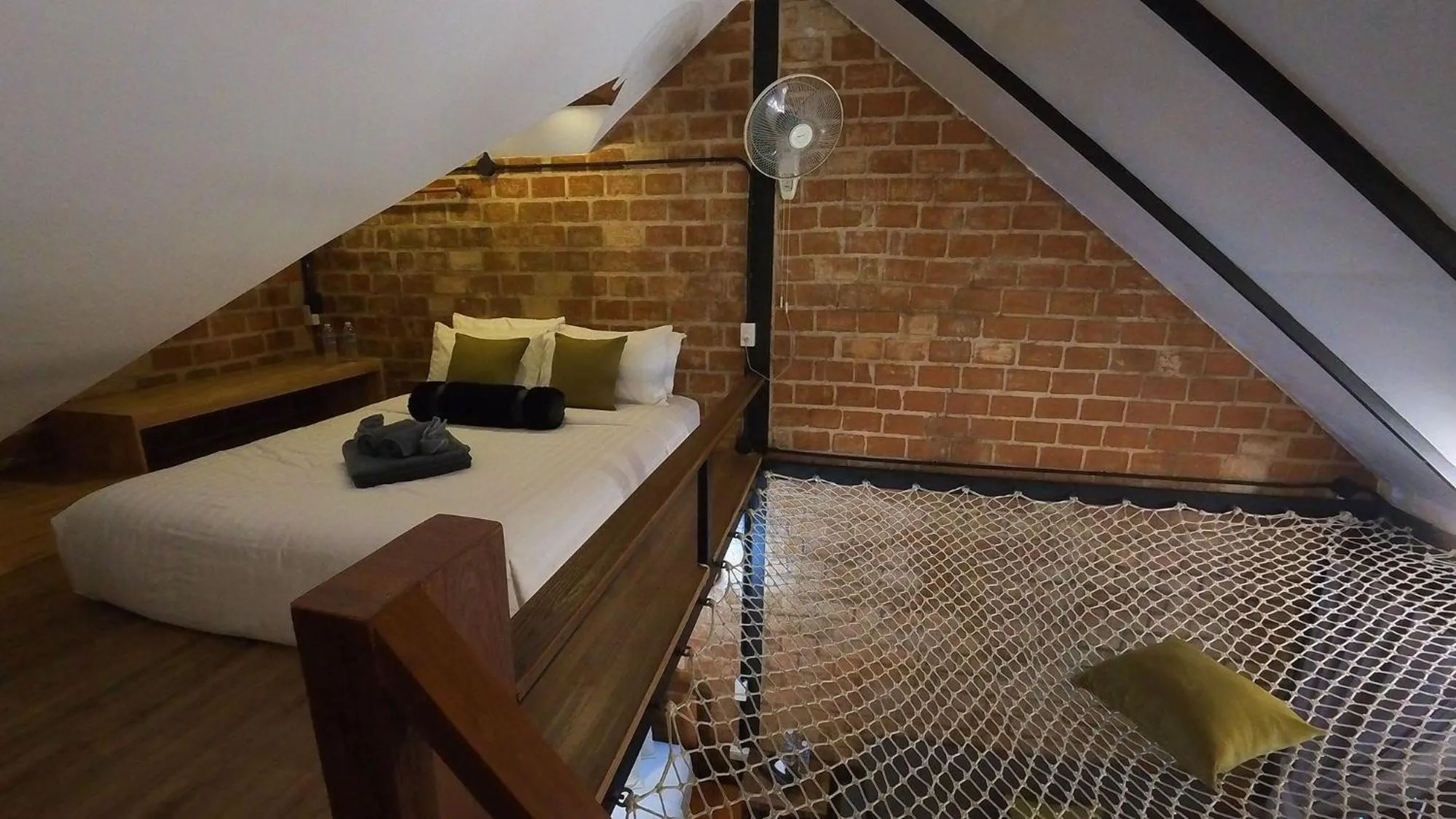 Bed in Tolani Riverside Villa