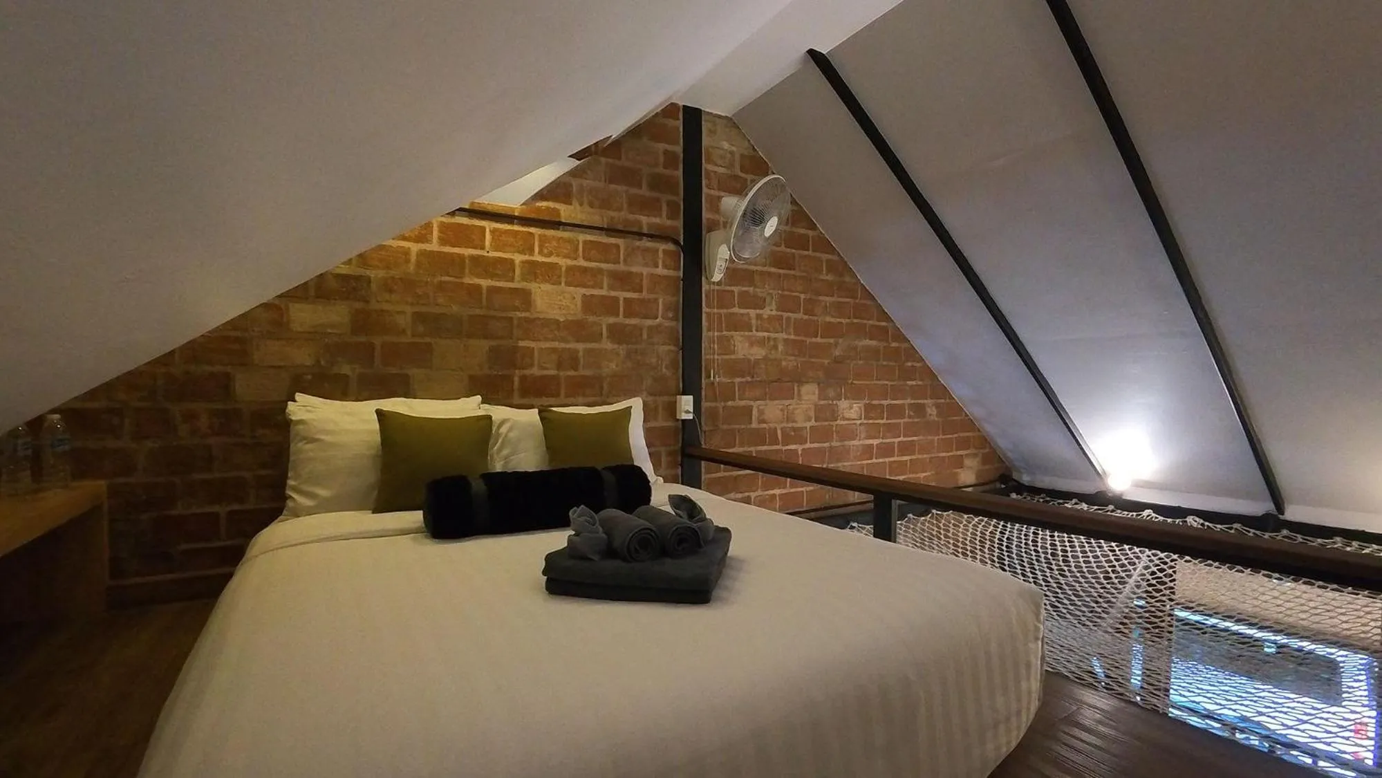 Bed in Tolani Riverside Villa