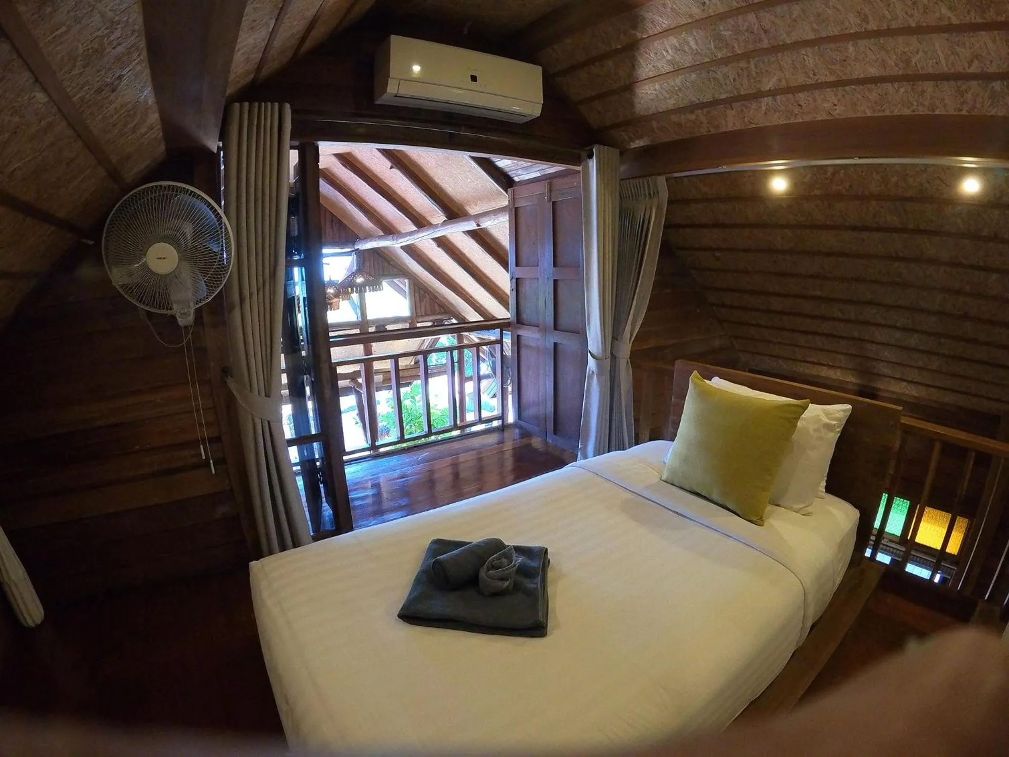 Bed in Tolani Riverside Villa