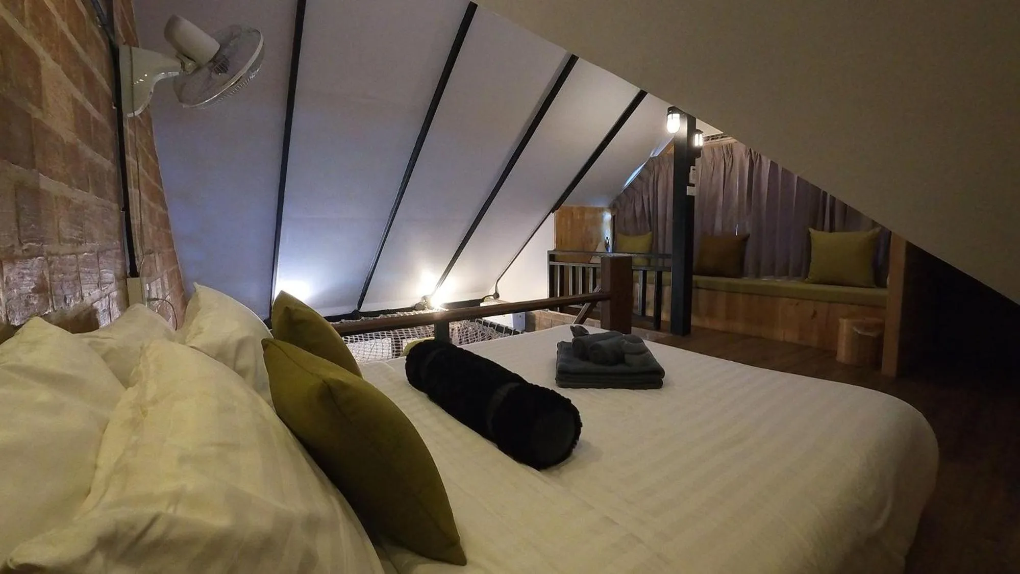 Bed in Tolani Riverside Villa