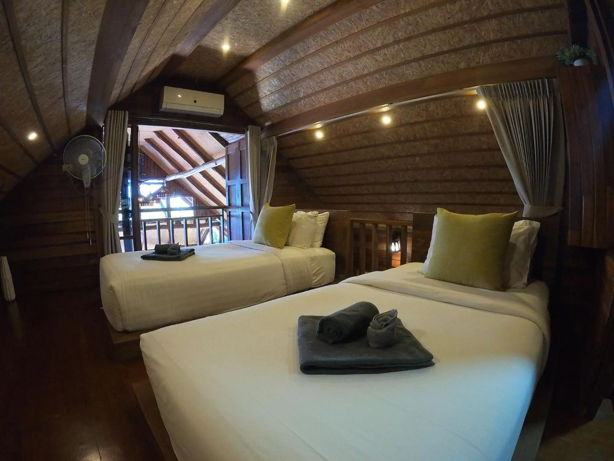 Bed in Tolani Riverside Villa