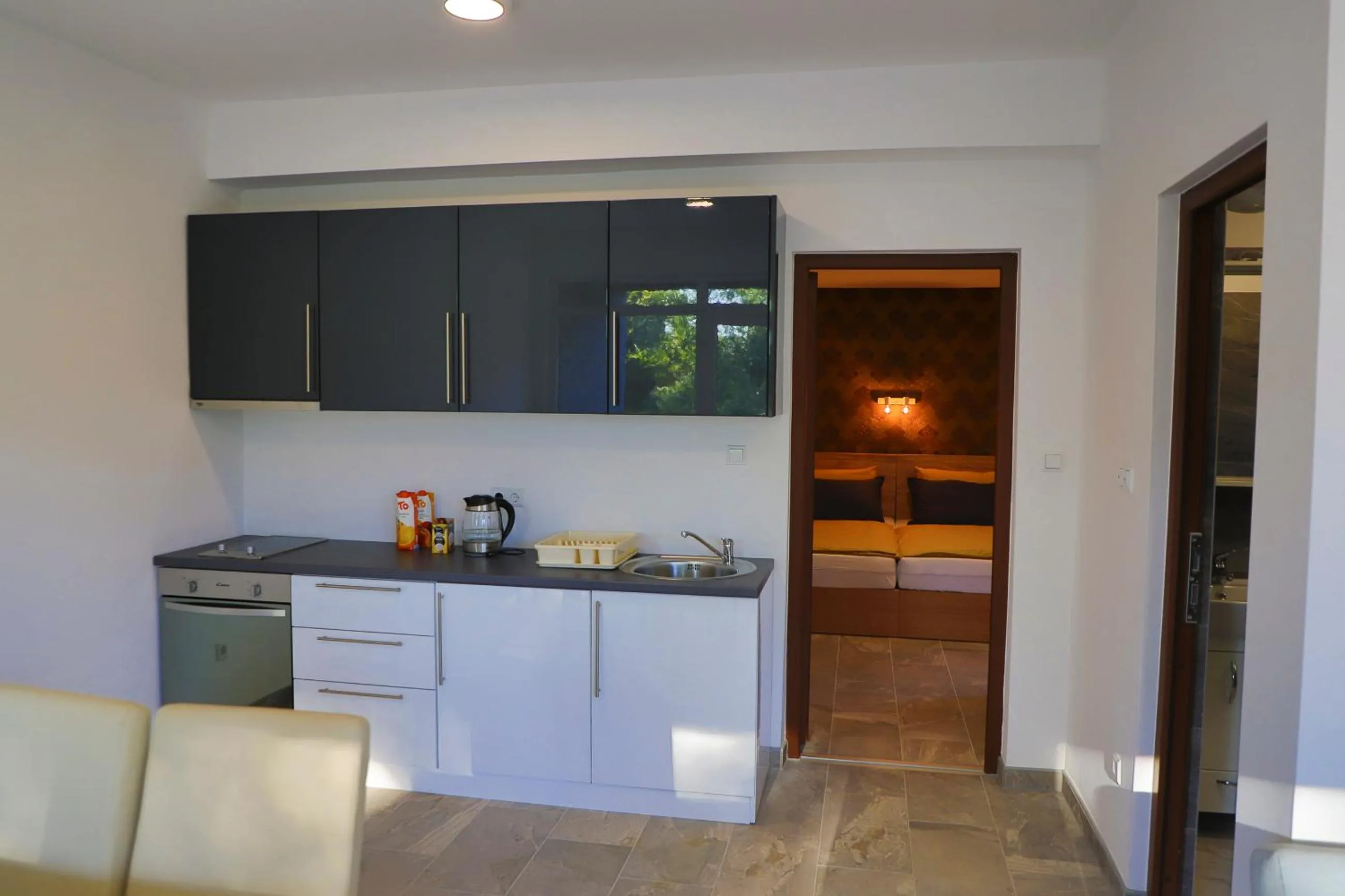 Kitchen or kitchenette in Apartment Vila Tara