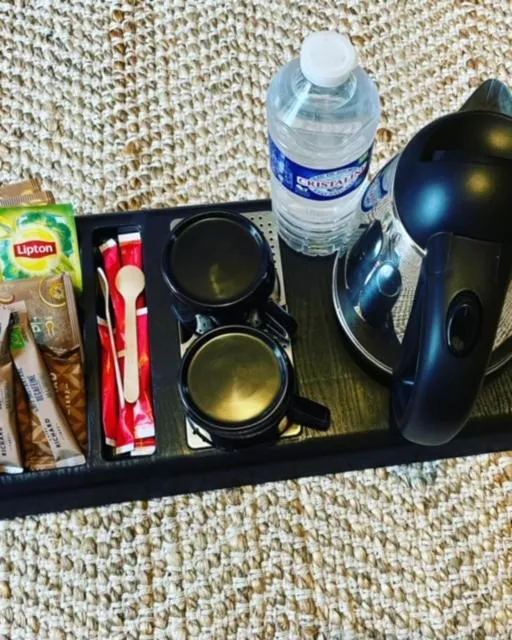 Coffee/tea facilities in Hôtel de la Côte Fleurie