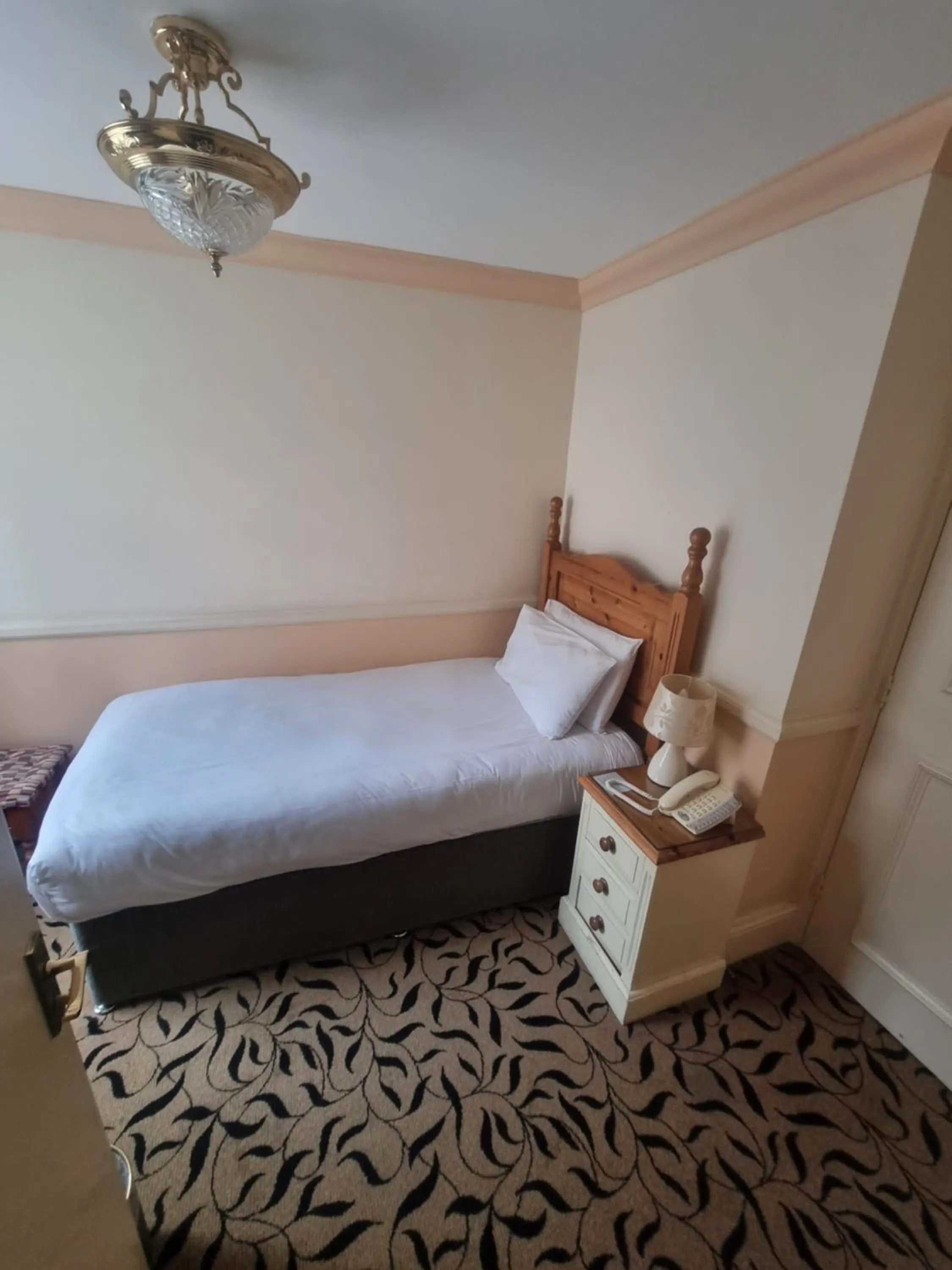 Bed in The Royal Oak Hotel