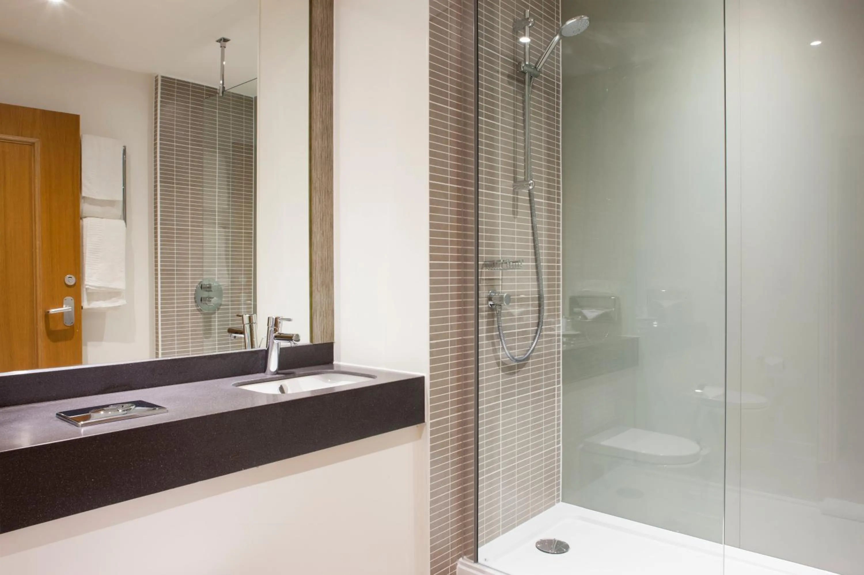 Bathroom in Holiday Inn Ashford Central by IHG