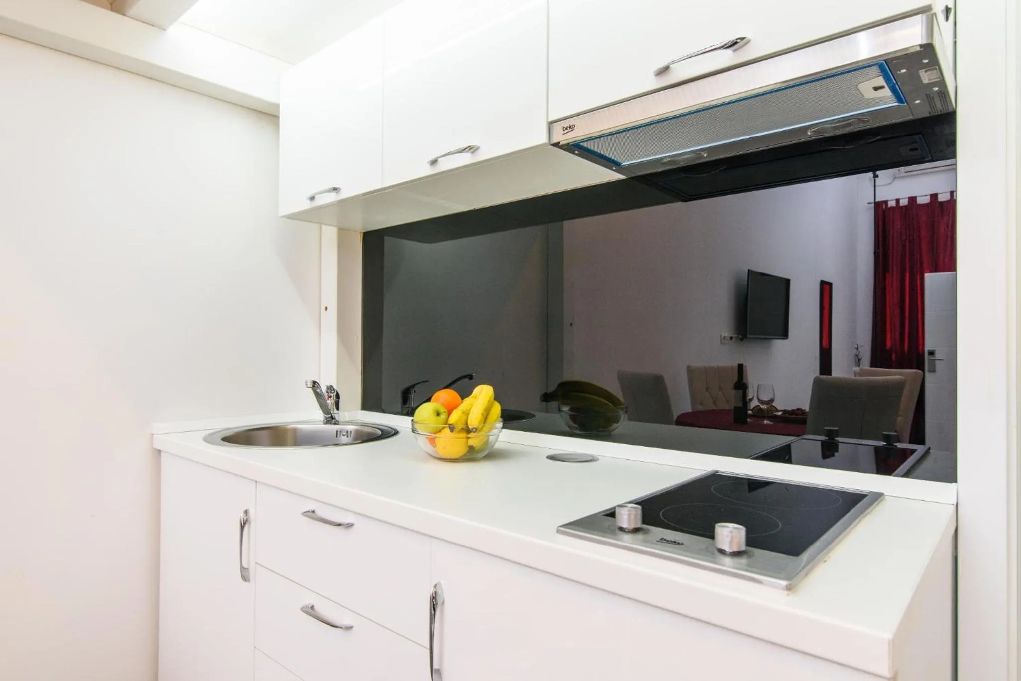 Kitchen or kitchenette in Studio Apartman REA