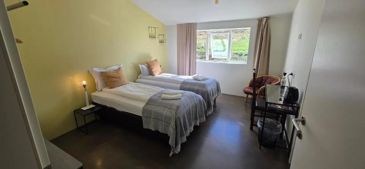 Bed in Fljótsbakki Hotel