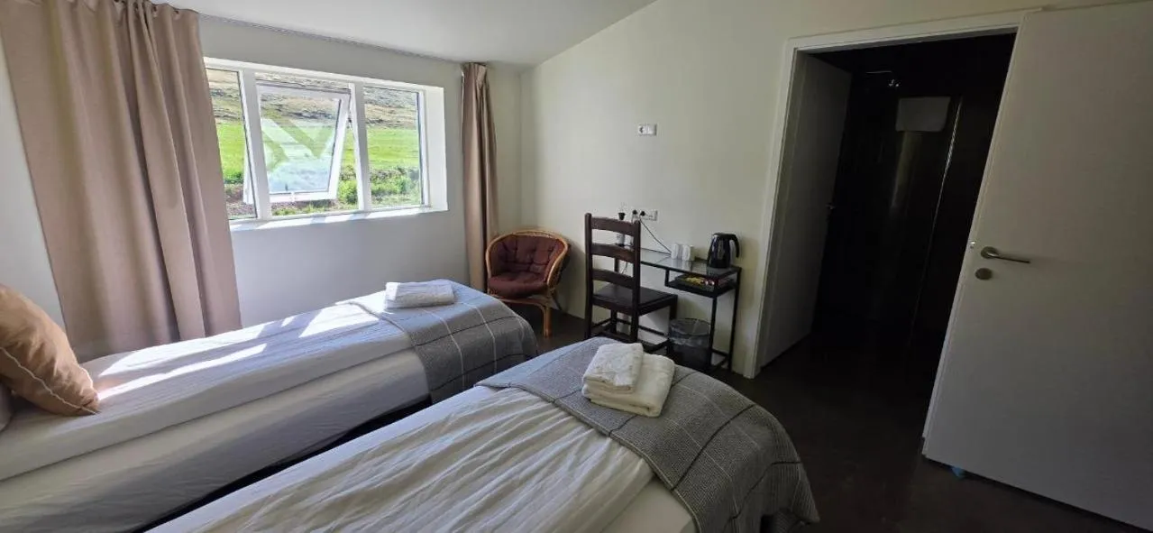 Bed in Fljótsbakki Hotel