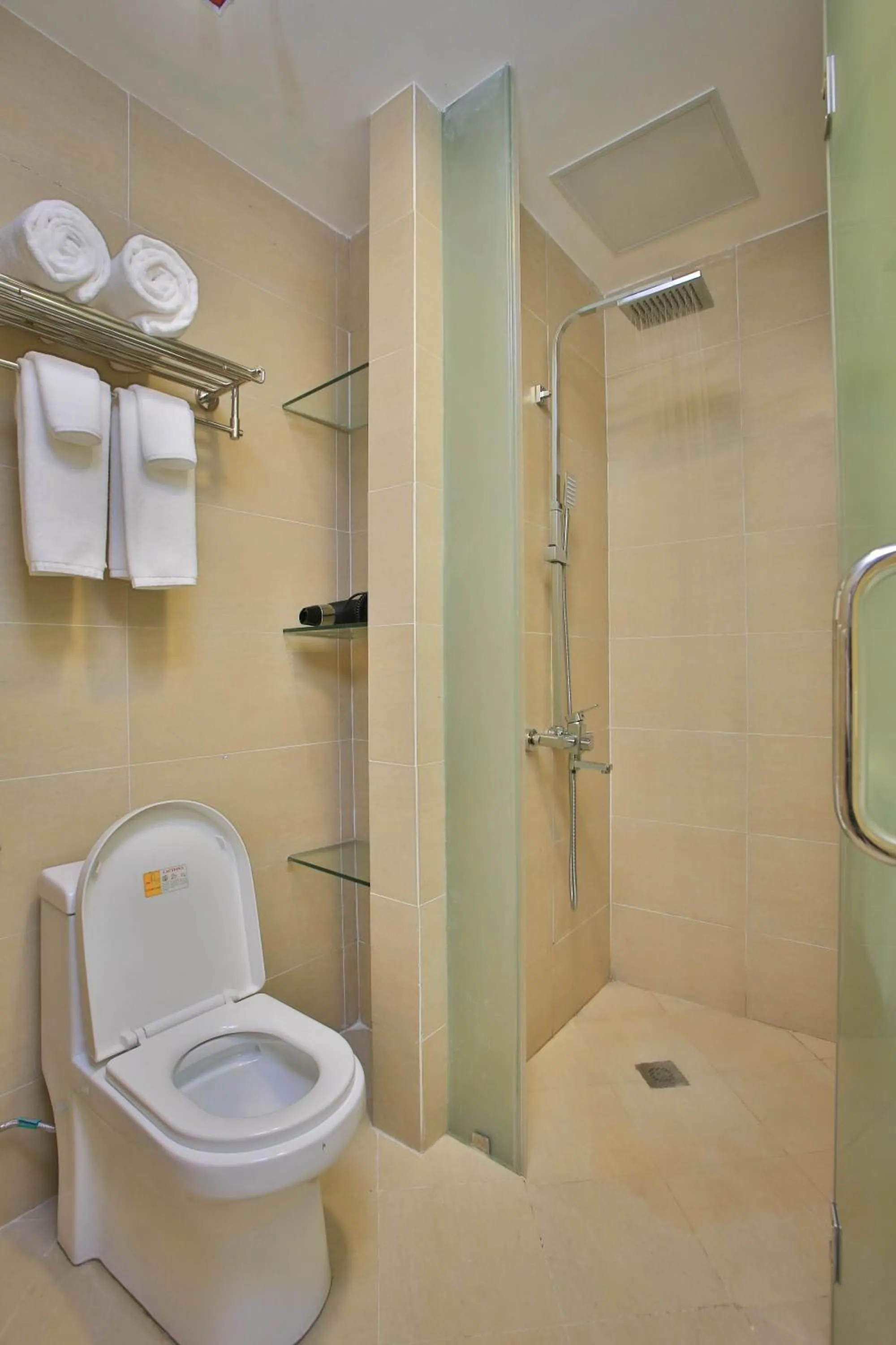 Shower in Valero Grand Suites by Swiss-Belhotel