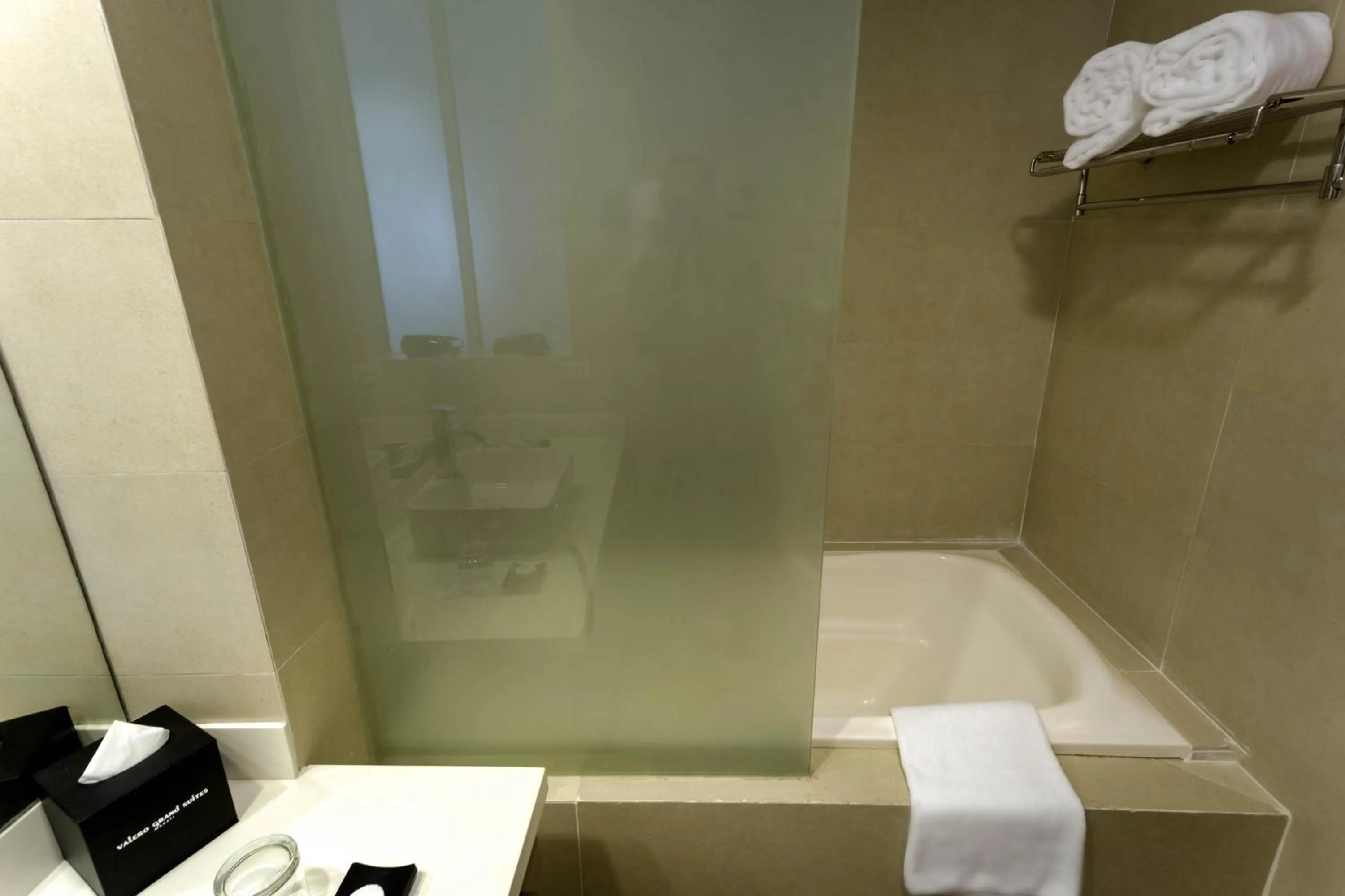 Shower in Valero Grand Suites by Swiss-Belhotel