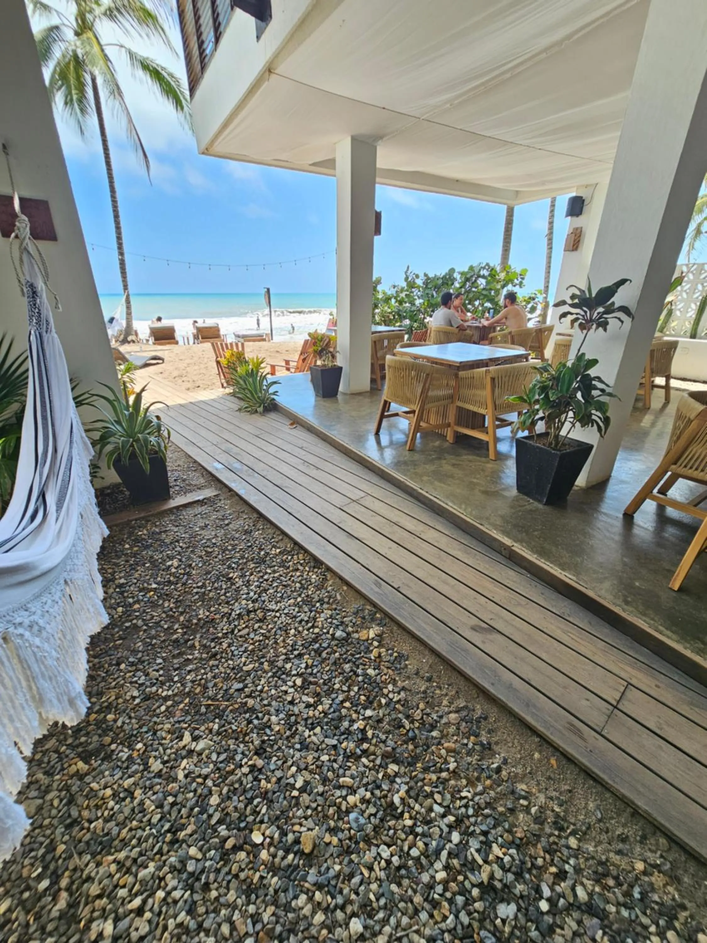 Communal lounge/ TV room in Makao Beach Hotel