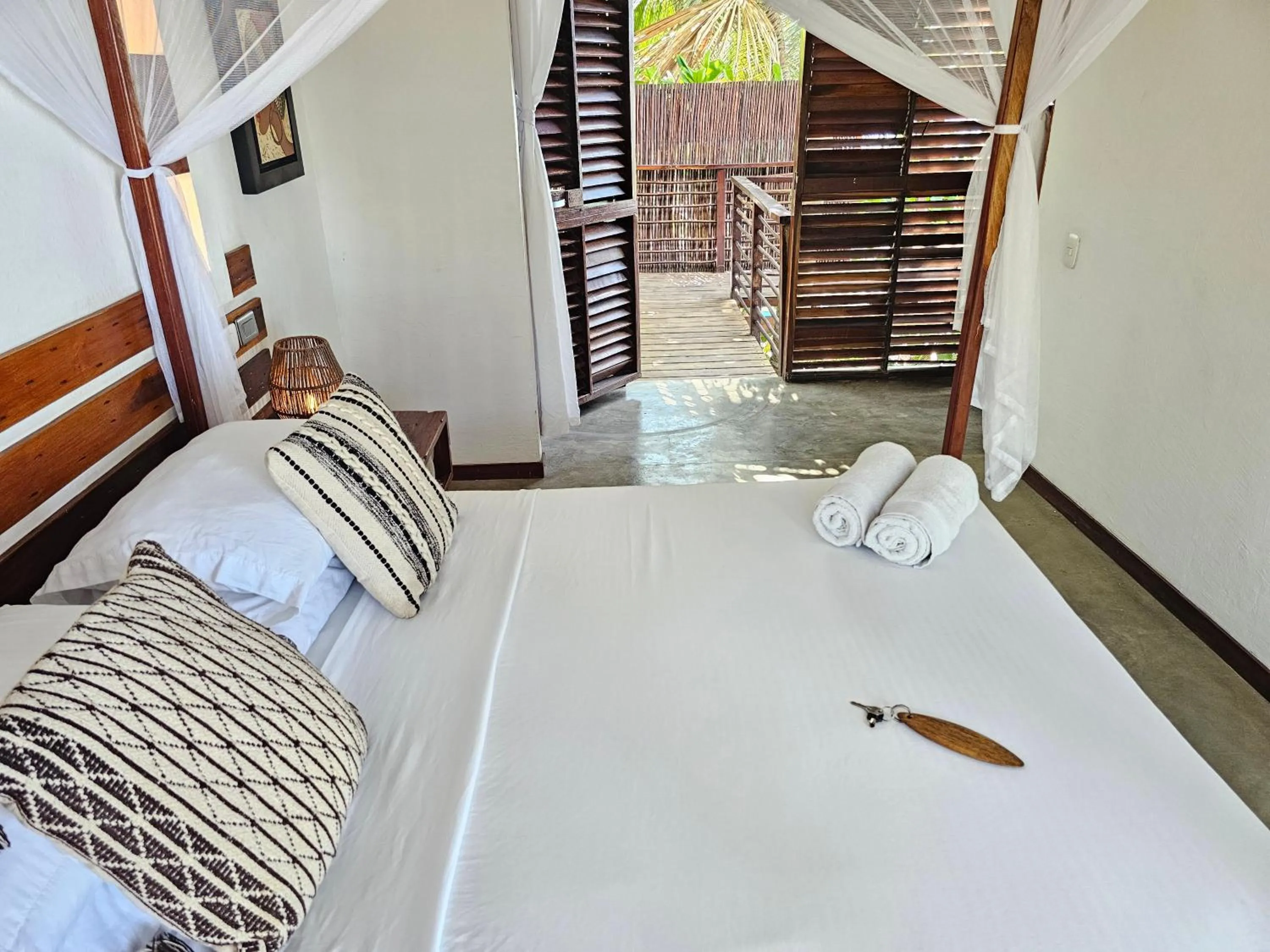 Bed in Makao Beach Hotel