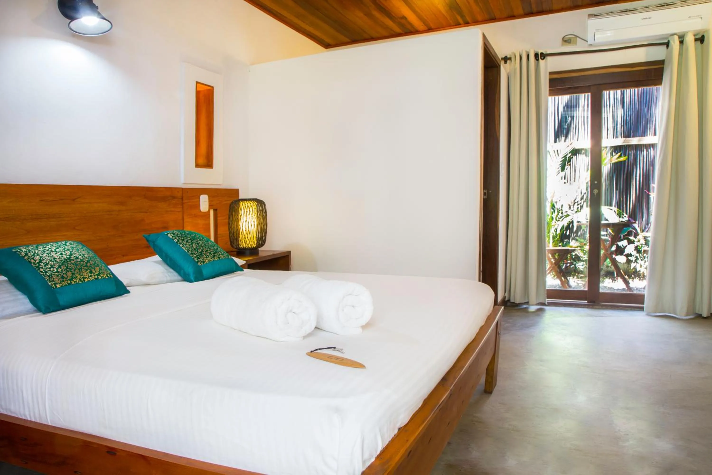 Balcony/Terrace, Bed in Makao Beach Hotel