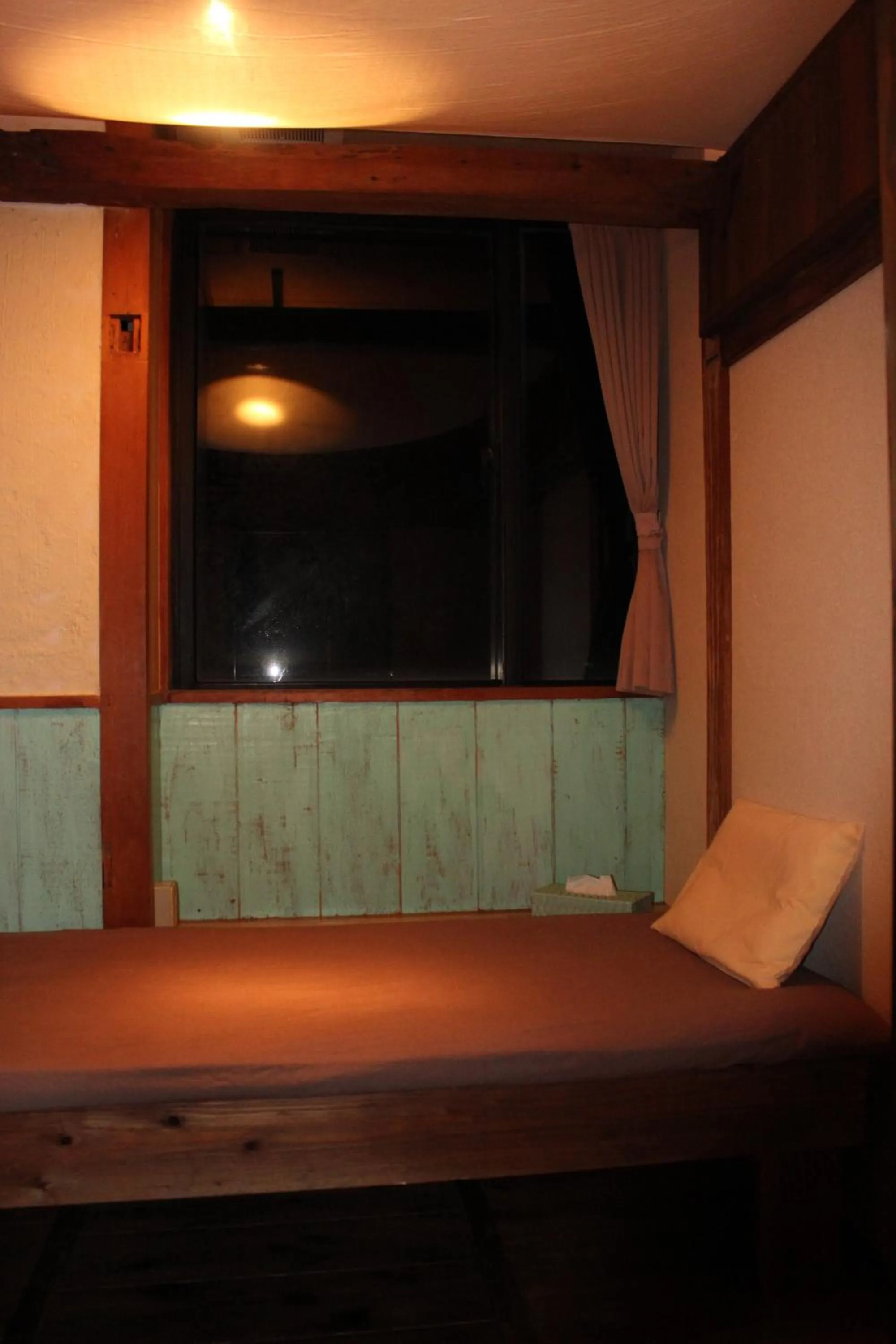 View (from property/room), Bed in guest house Holoholo Ishigakijima