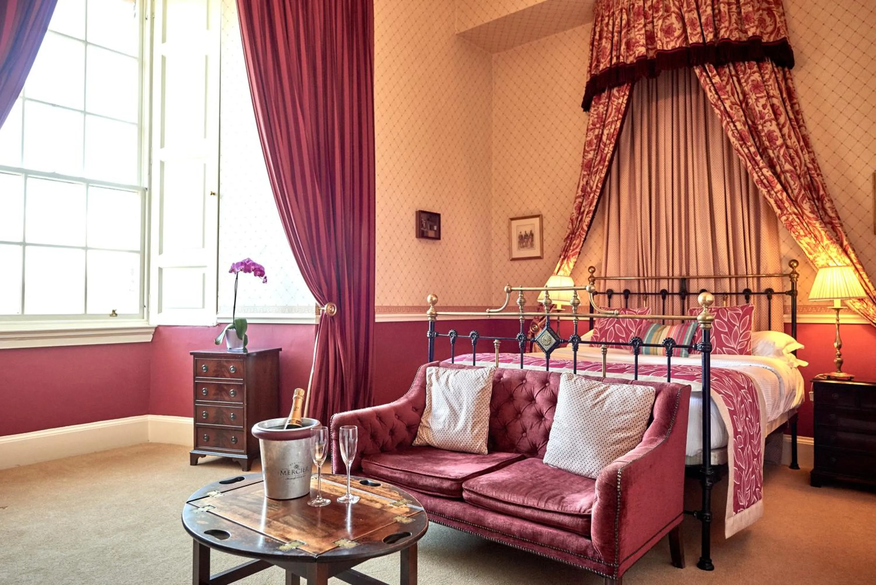 Seating area, Bed in Dalhousie Castle Hotel
