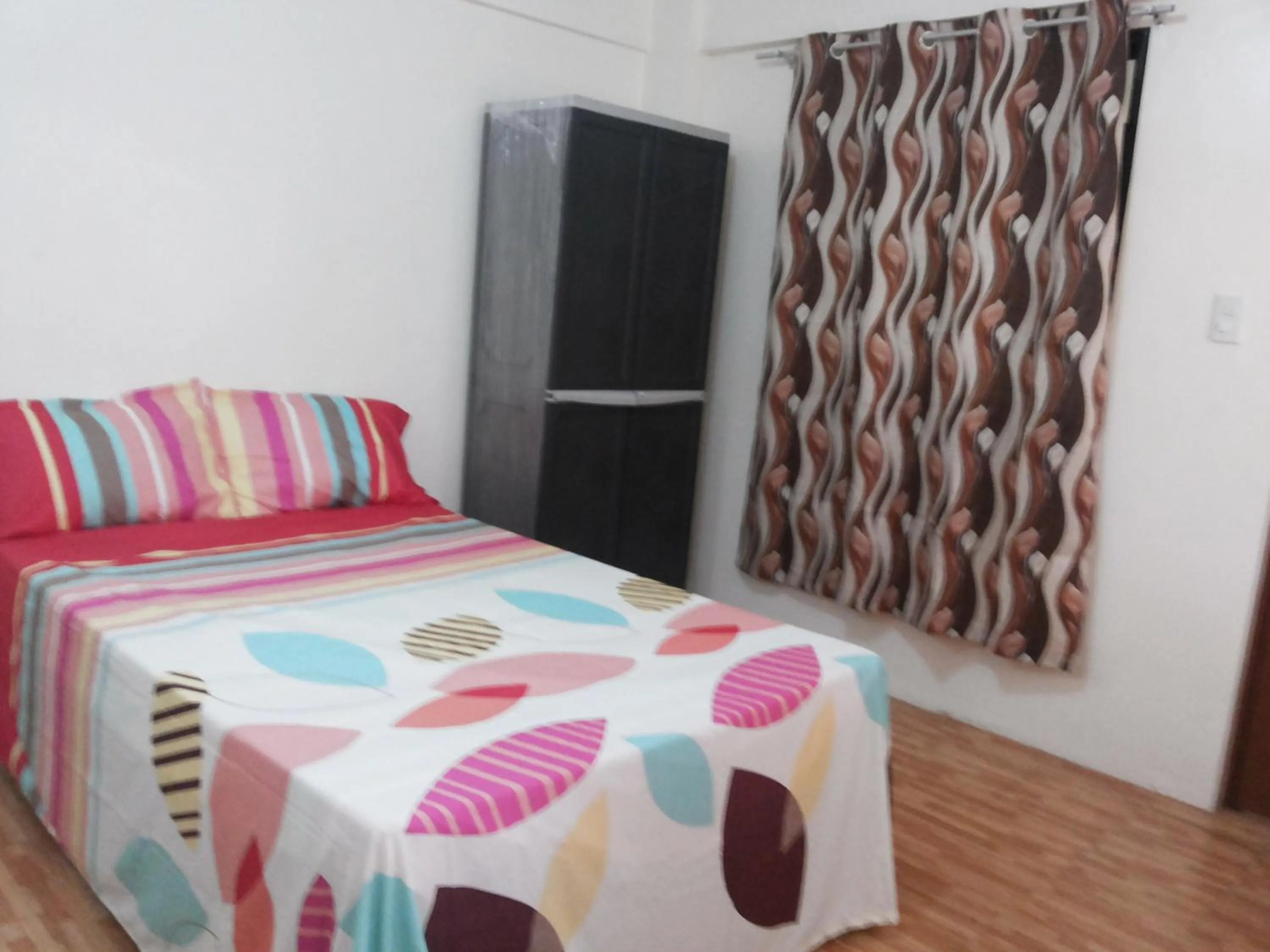 Bed in Budget Studio Unit in Makati