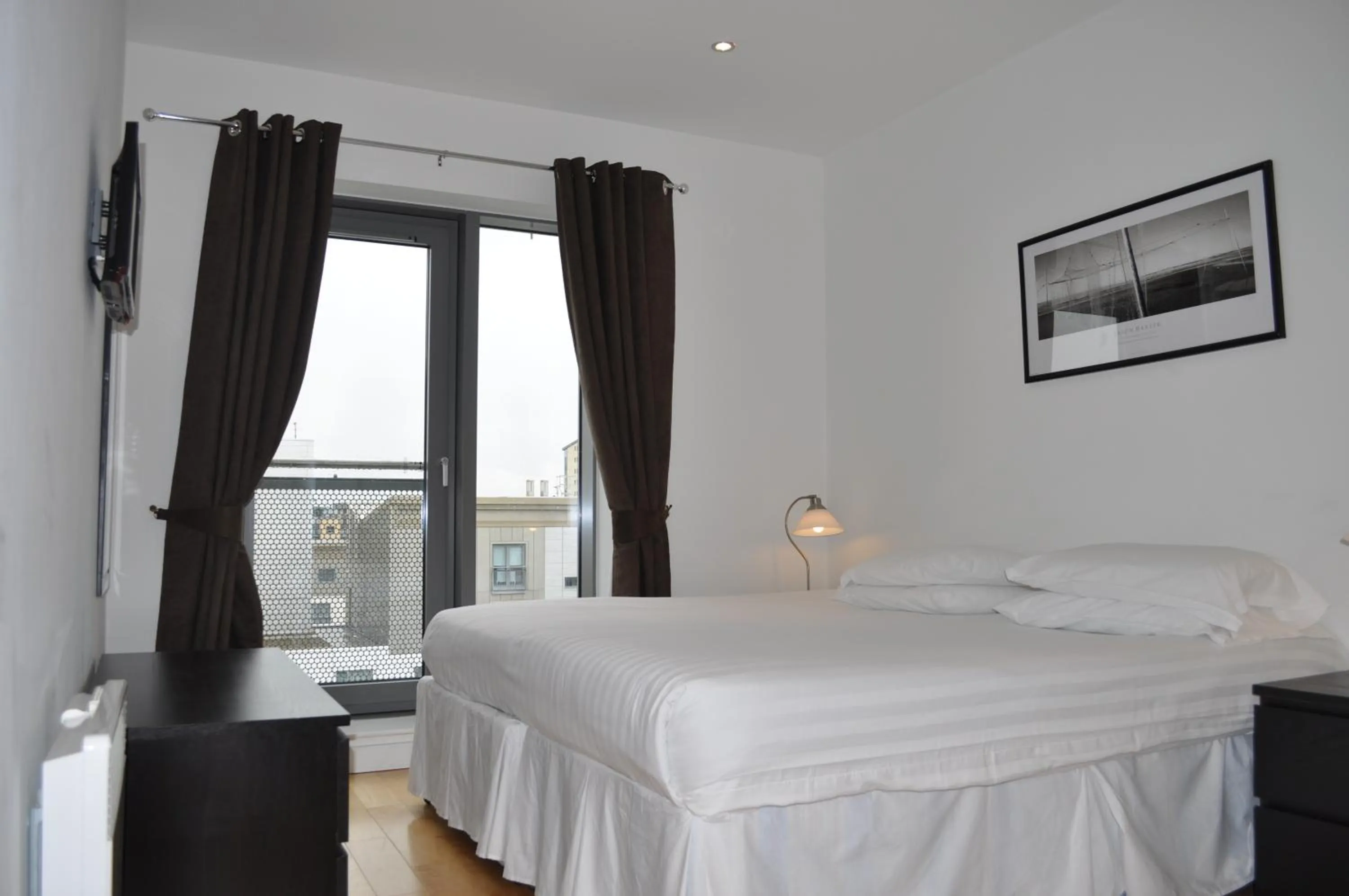 Bed in Ocean Serviced Apartments