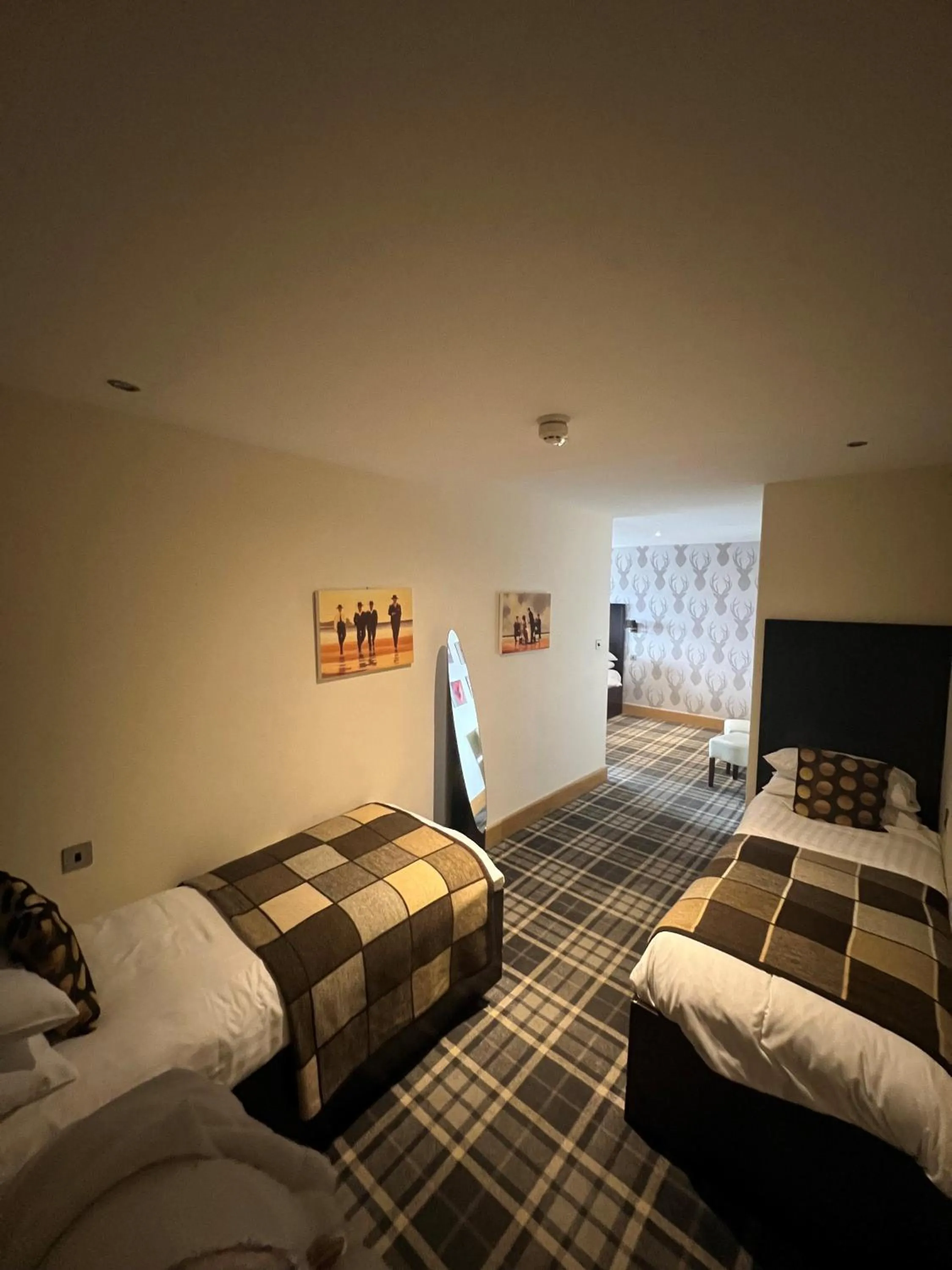 Bed in Inn On The Prom At The Fernlea Hotel