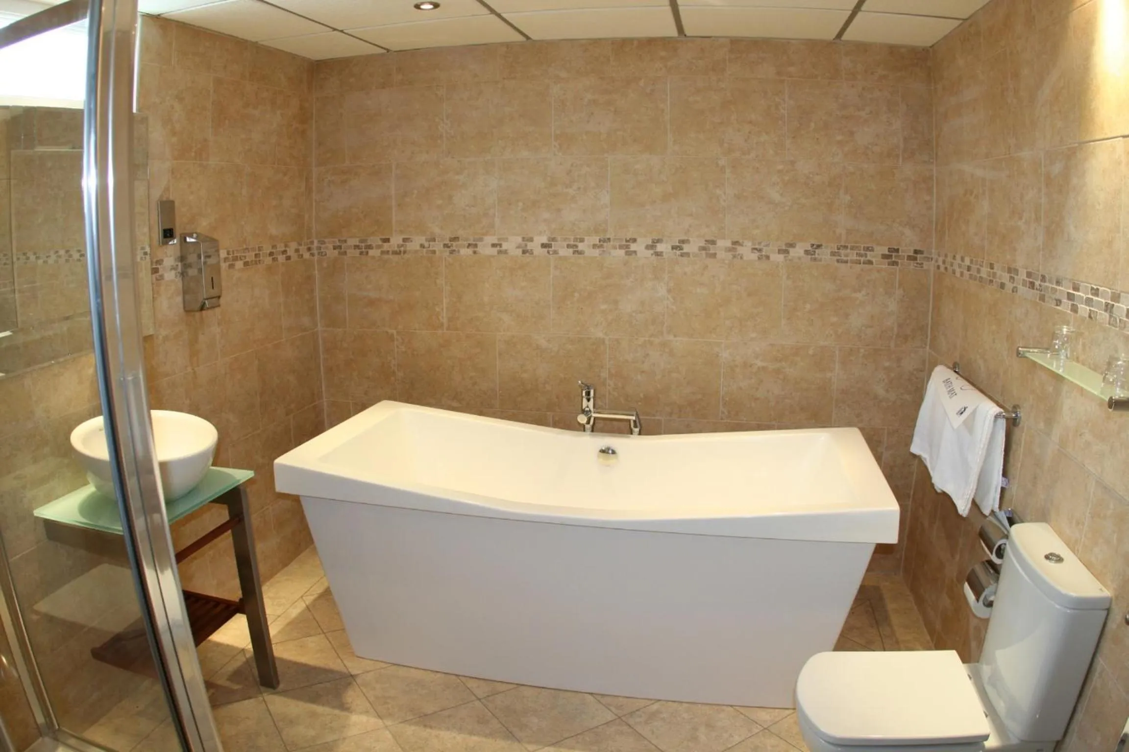 Bathroom in Inn On The Prom At The Fernlea Hotel