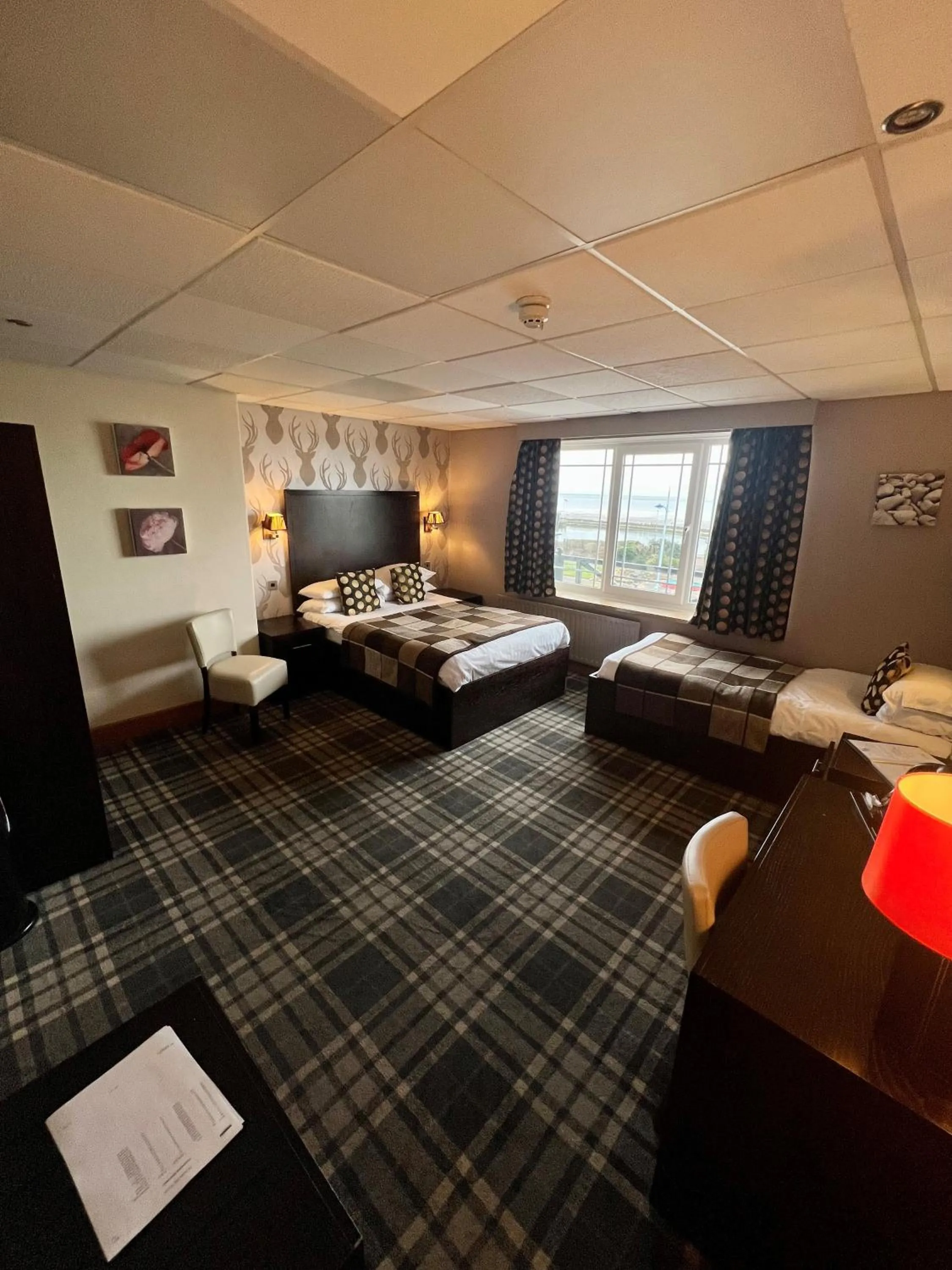 Bed in Inn On The Prom At The Fernlea Hotel