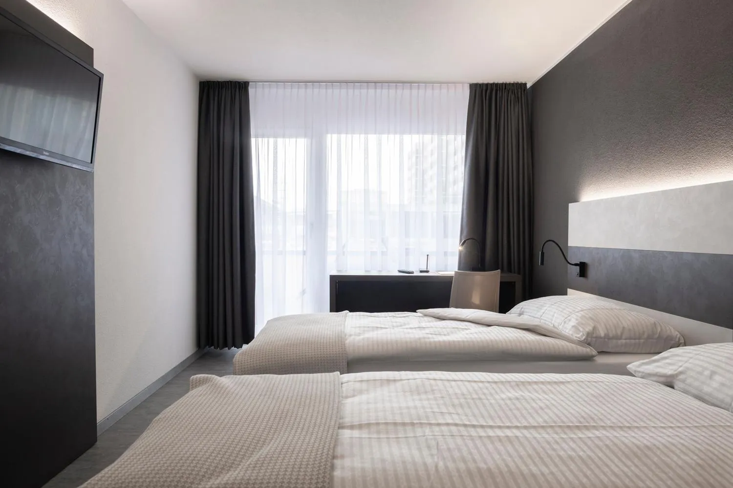 Bed in Hotel Bahnhof Zollikofen