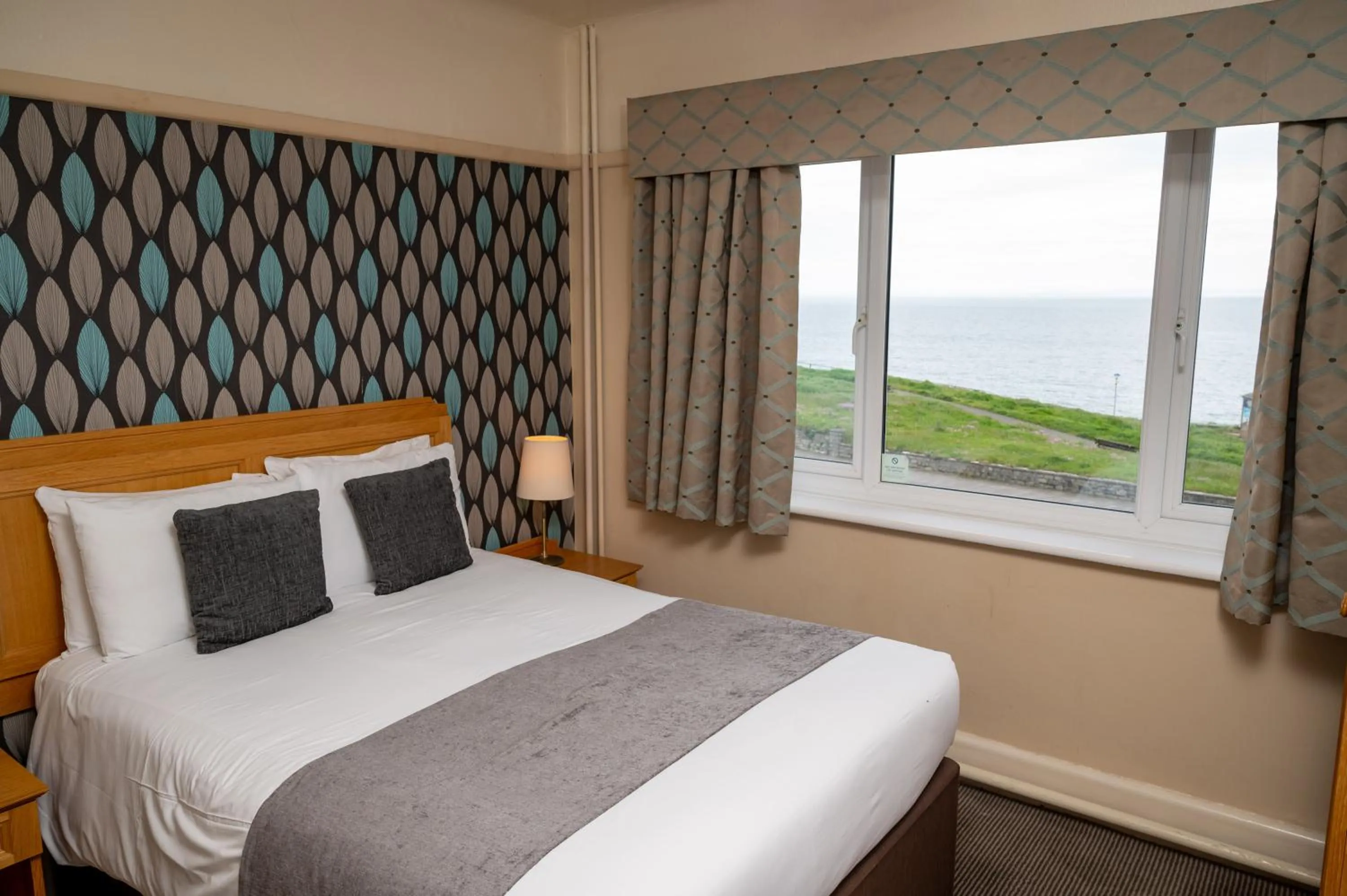 Bed in Commodore Hotel by Greene King Inns