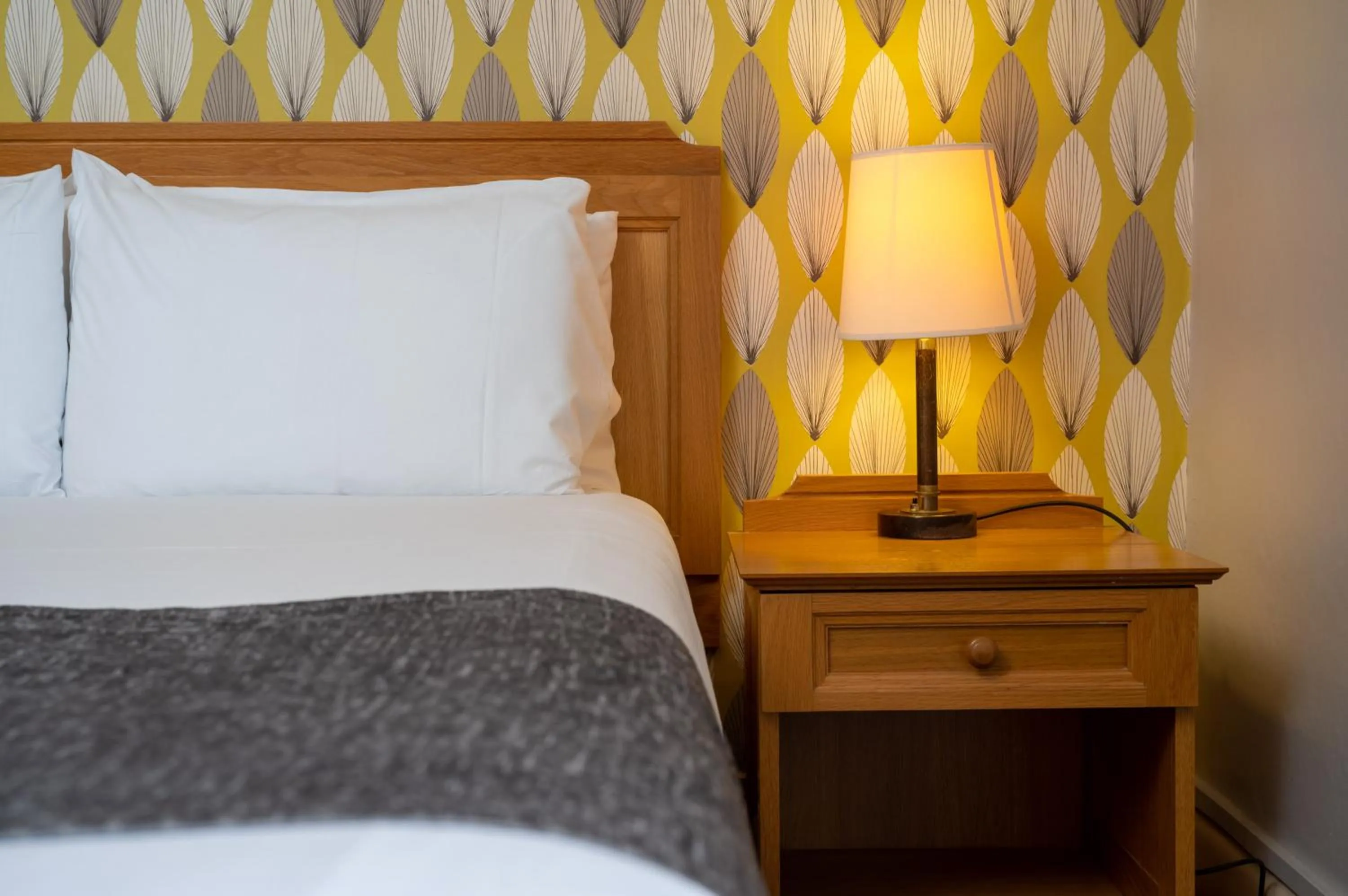 Bed in Commodore Hotel by Greene King Inns