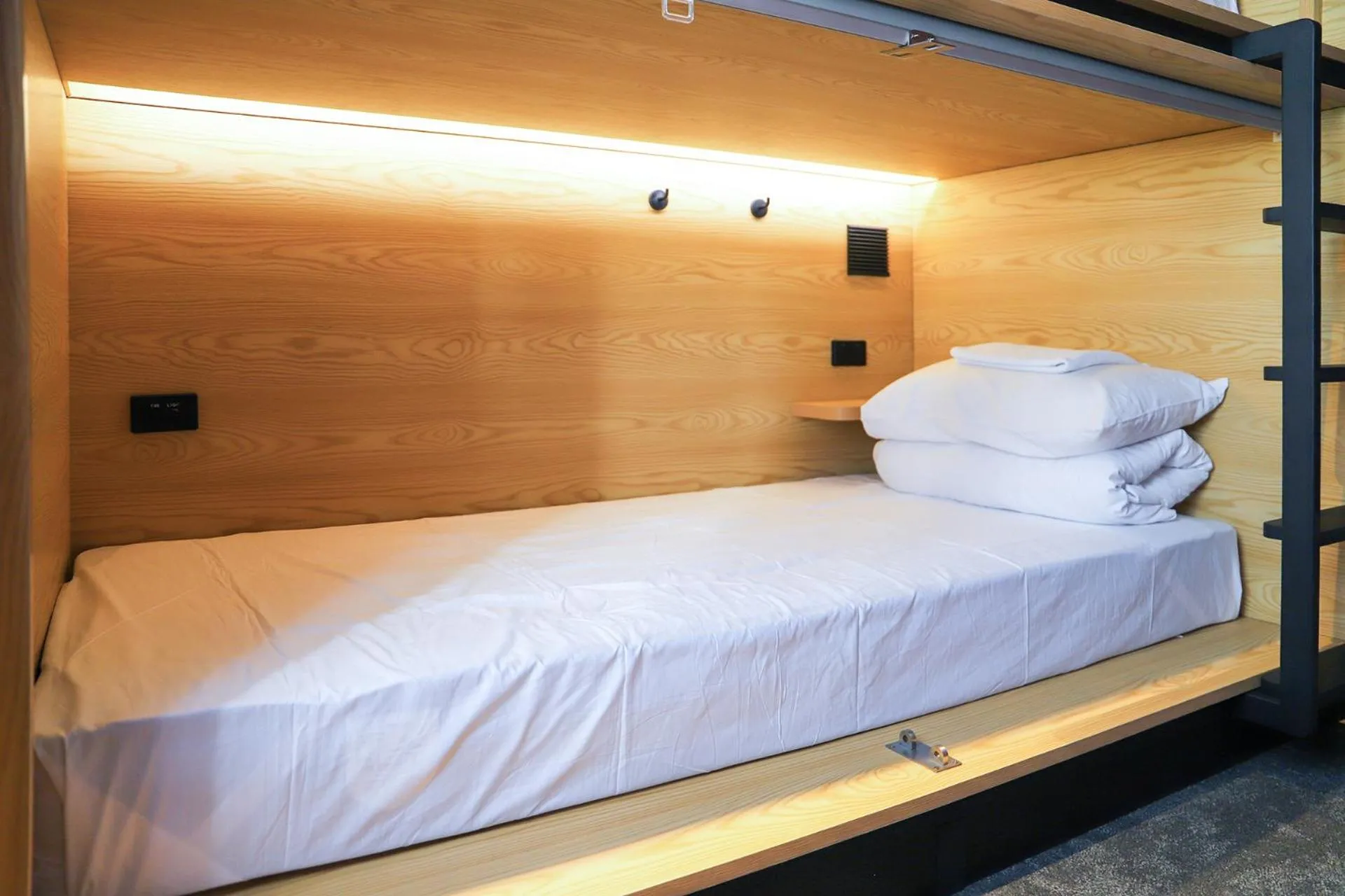Bed in The Capsule Hotel