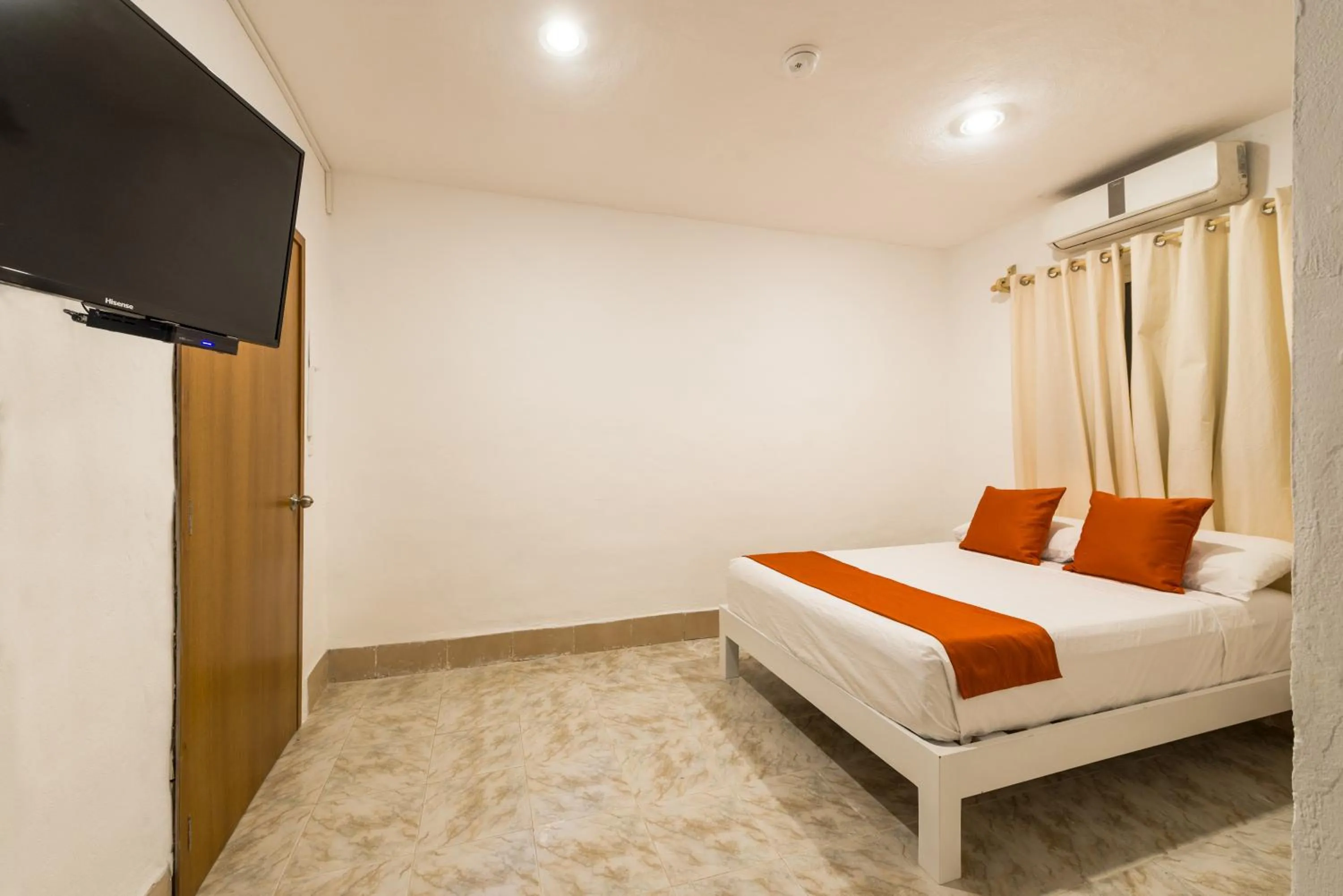 Bed in Hotel Caracol Puerto Morelos