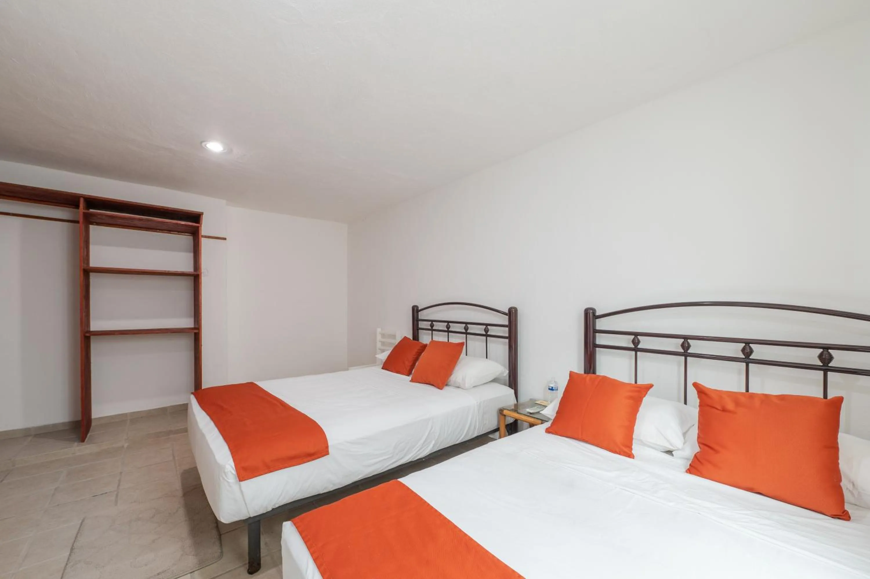 Bed in Hotel Caracol Puerto Morelos