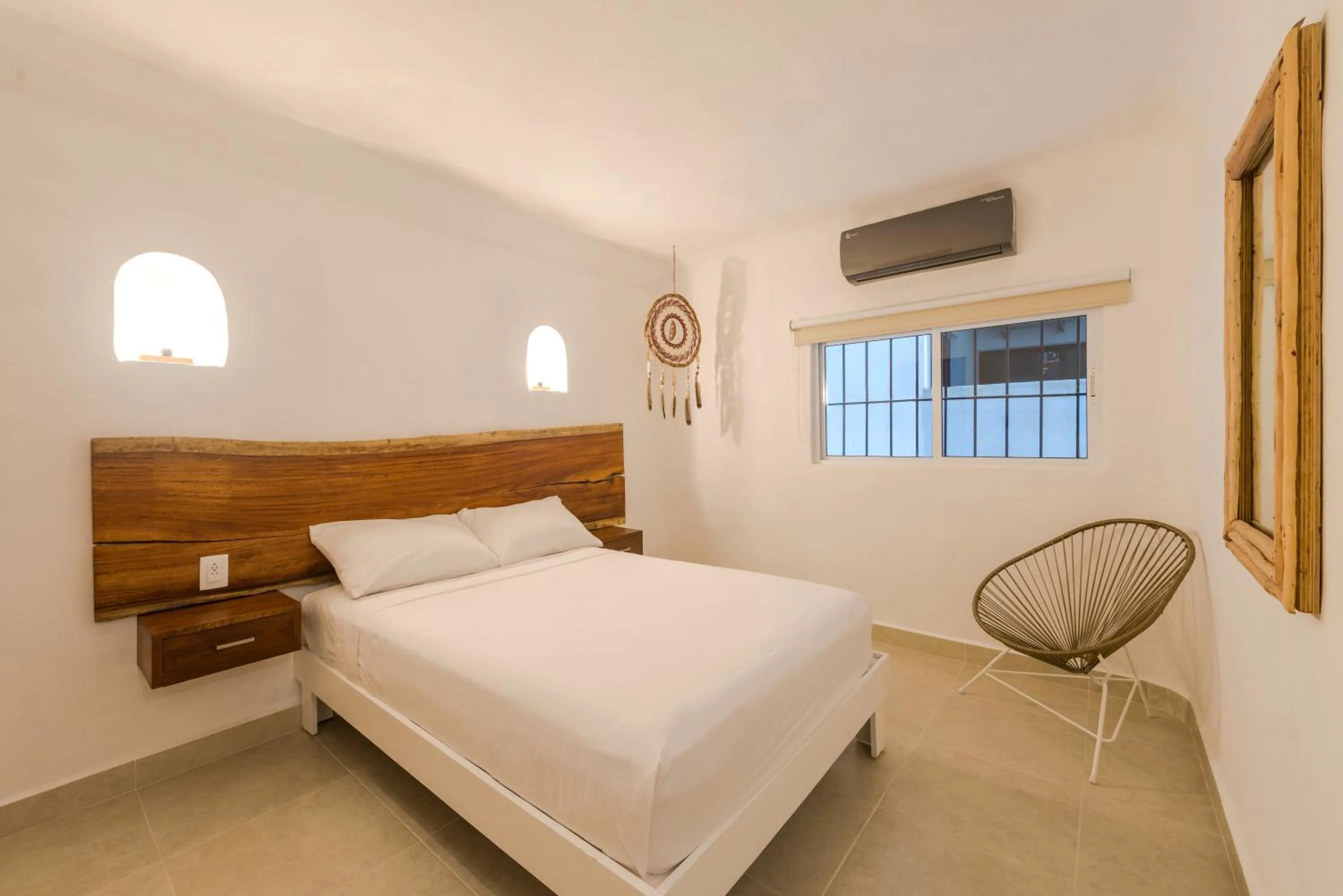 Bed in Hotel Caracol Puerto Morelos