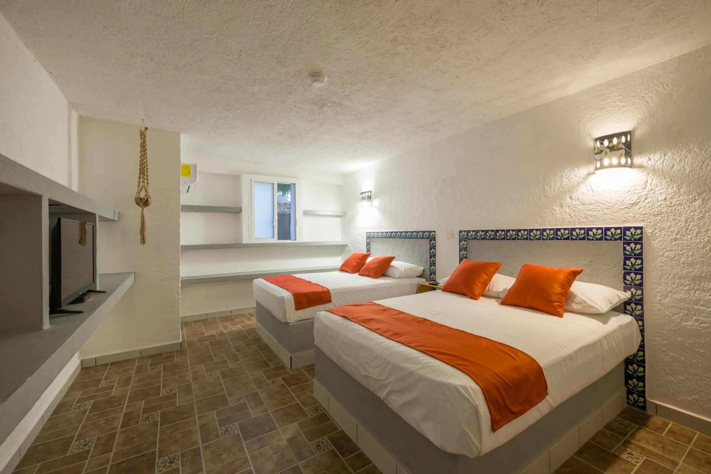 Bed in Hotel Caracol Puerto Morelos