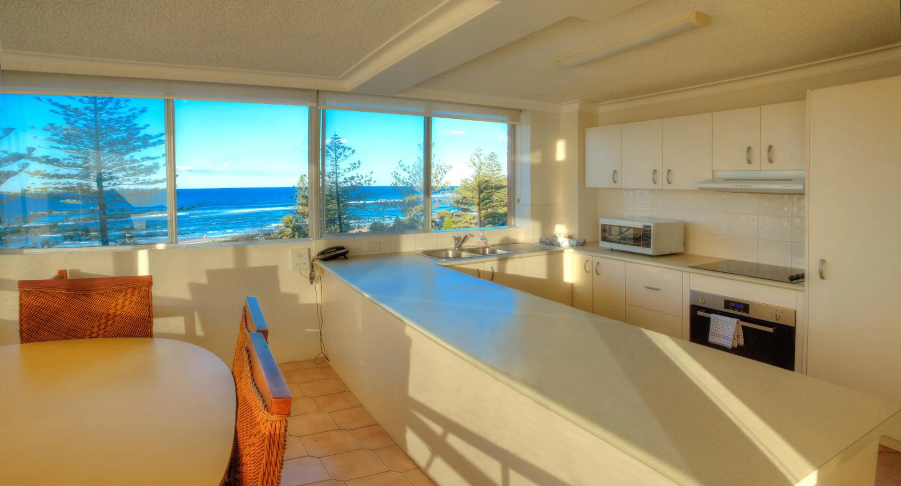 Kitchen or kitchenette in Oceania on Burleigh Beach
