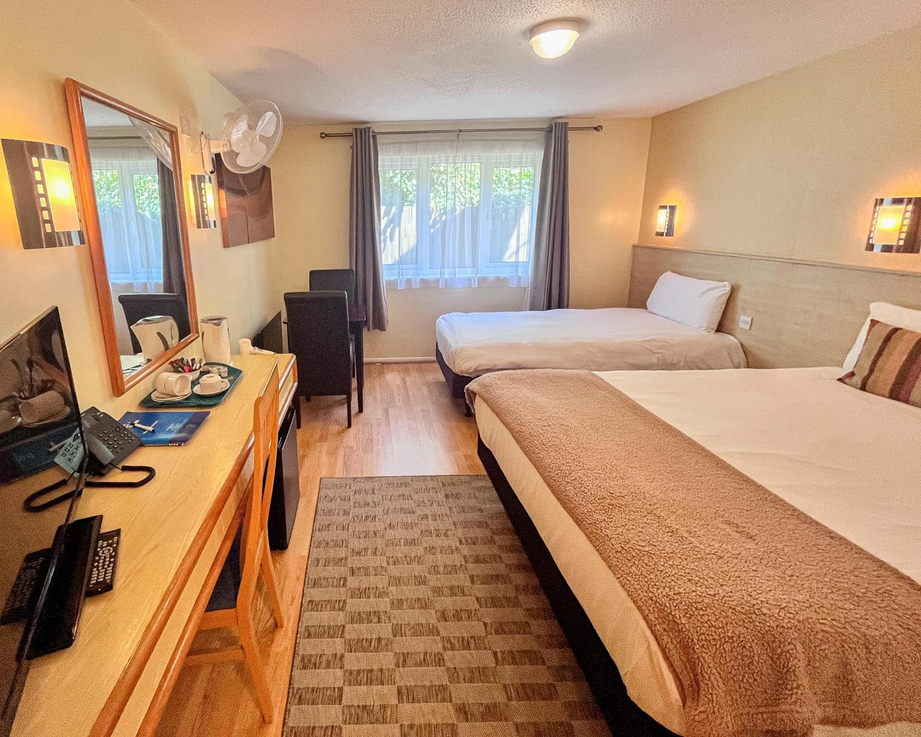 Bed in Travel Plaza Hotel