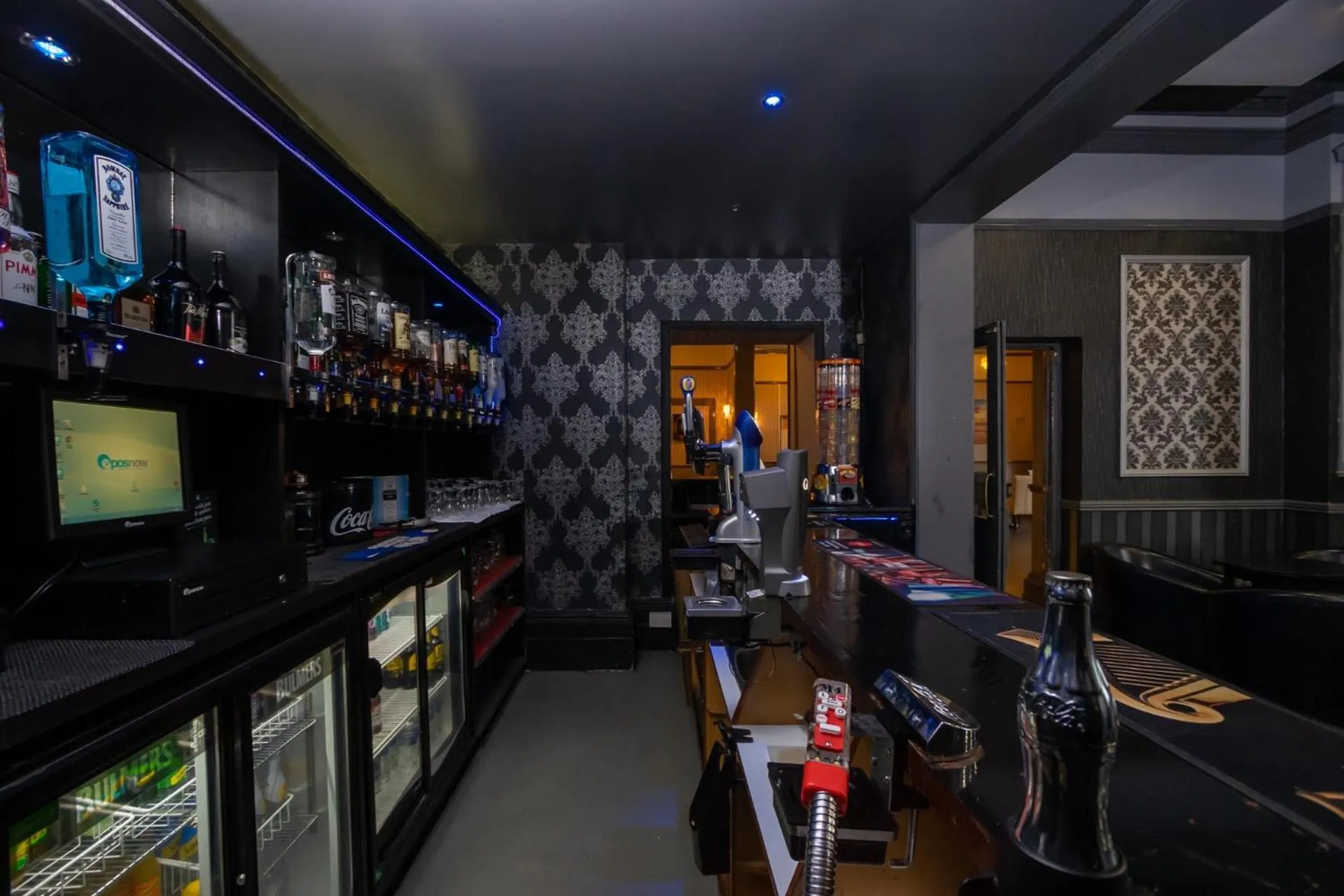 Communal lounge/ TV room in The Carlton Hotel