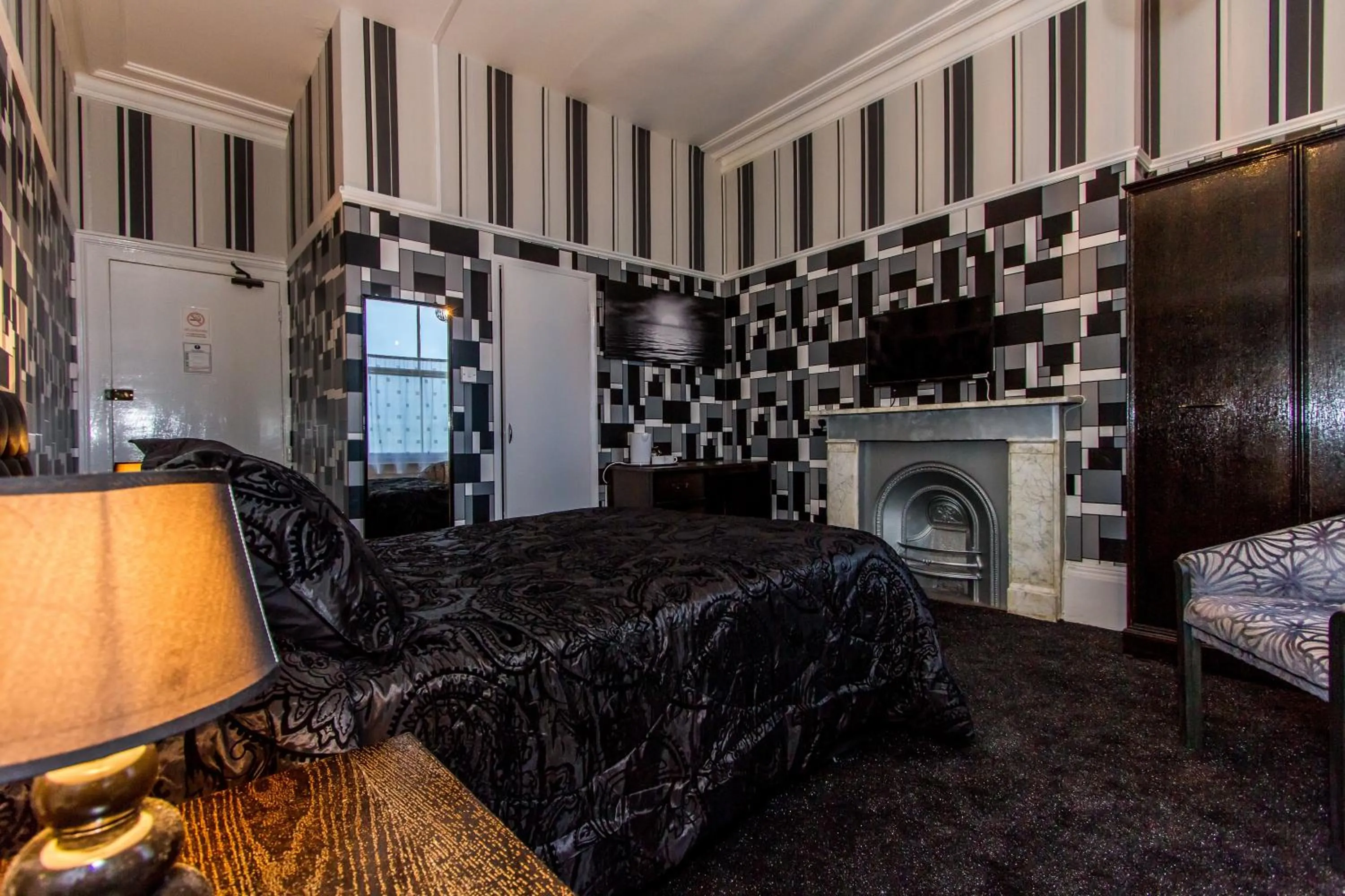 Bedroom in The Carlton Hotel