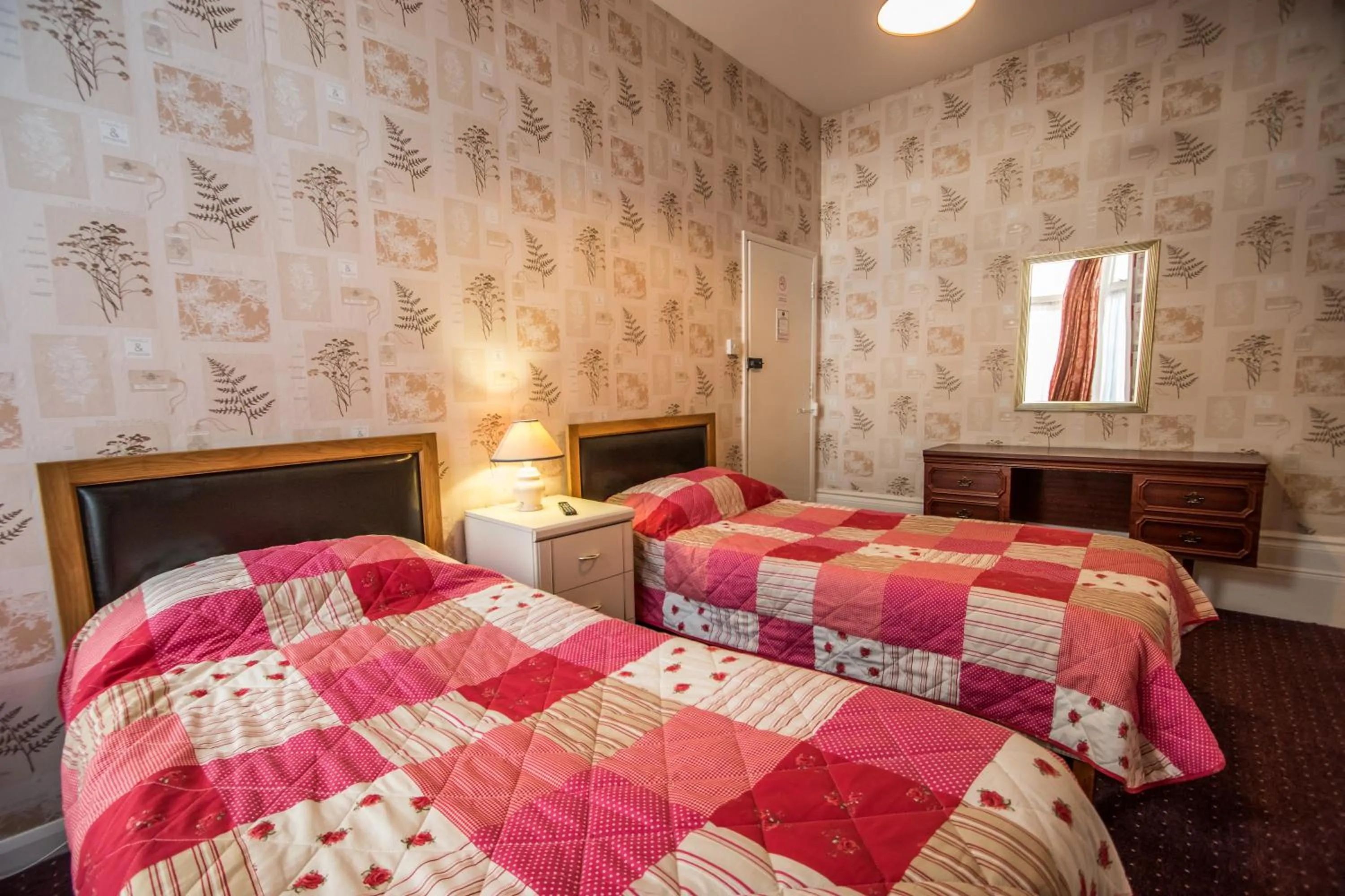 Photo of the whole room, Bed in The Carlton Hotel