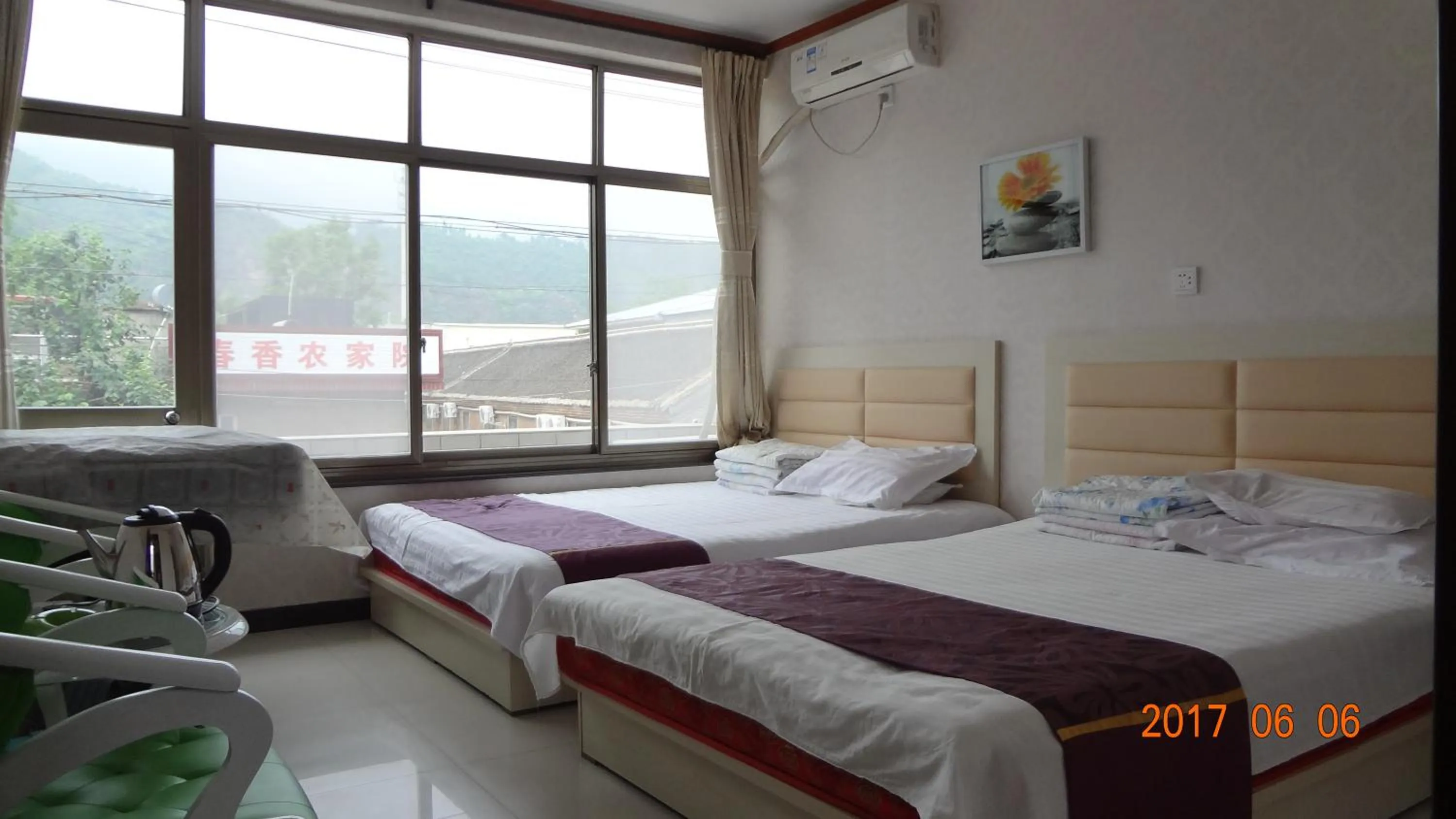 Bed in Huangyaguan Great Wall Li Bo Home Hotel