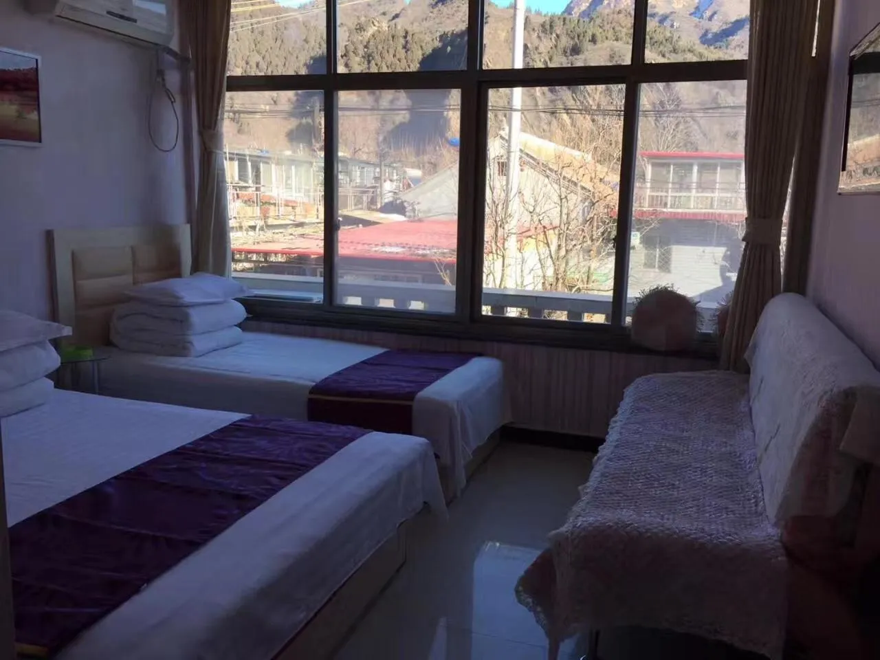 Bed in Huangyaguan Great Wall Li Bo Home Hotel