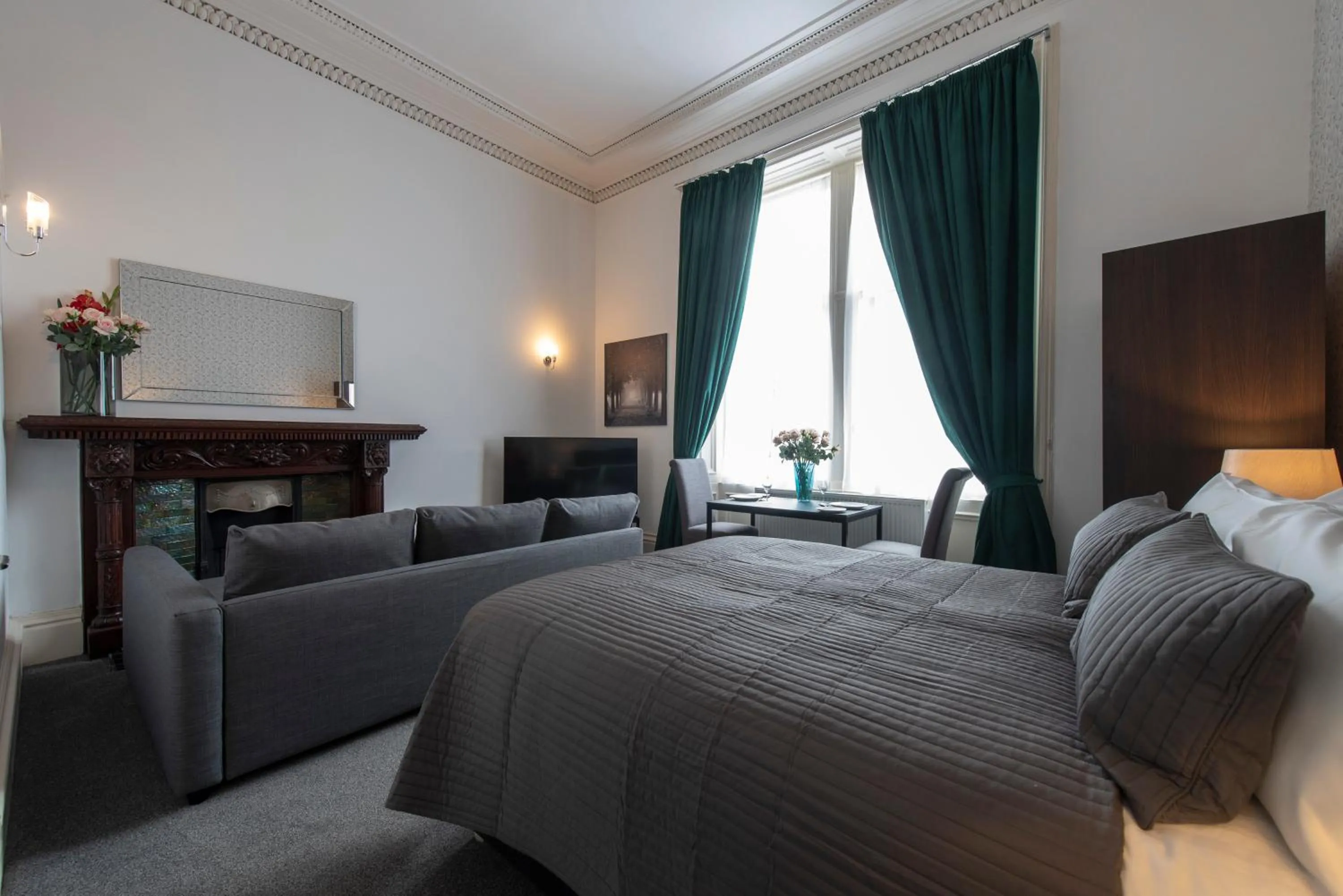 Bed in Grosvenor Suites