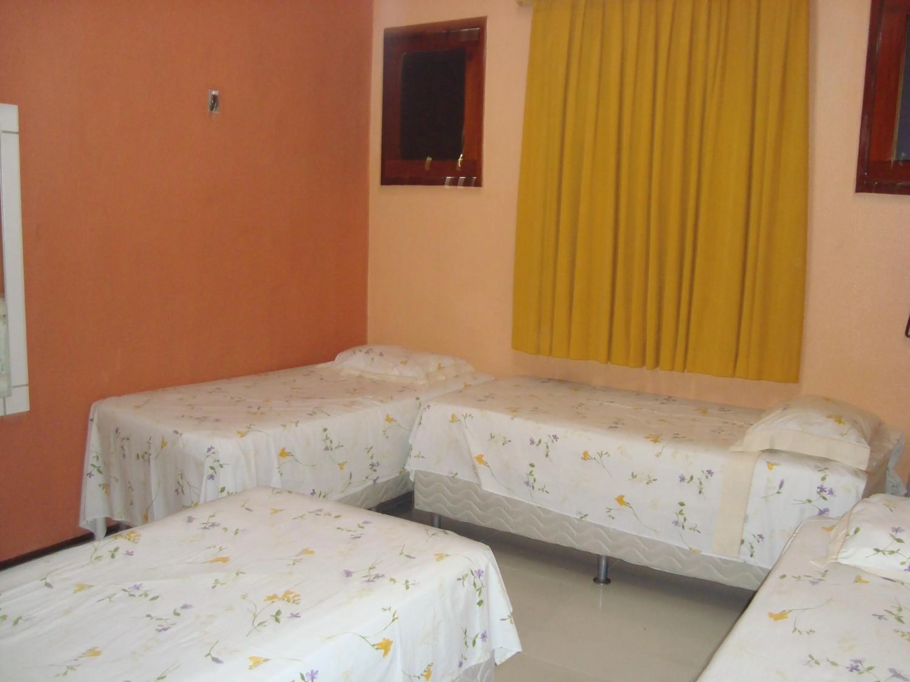 Bed in Pousada Vianna's