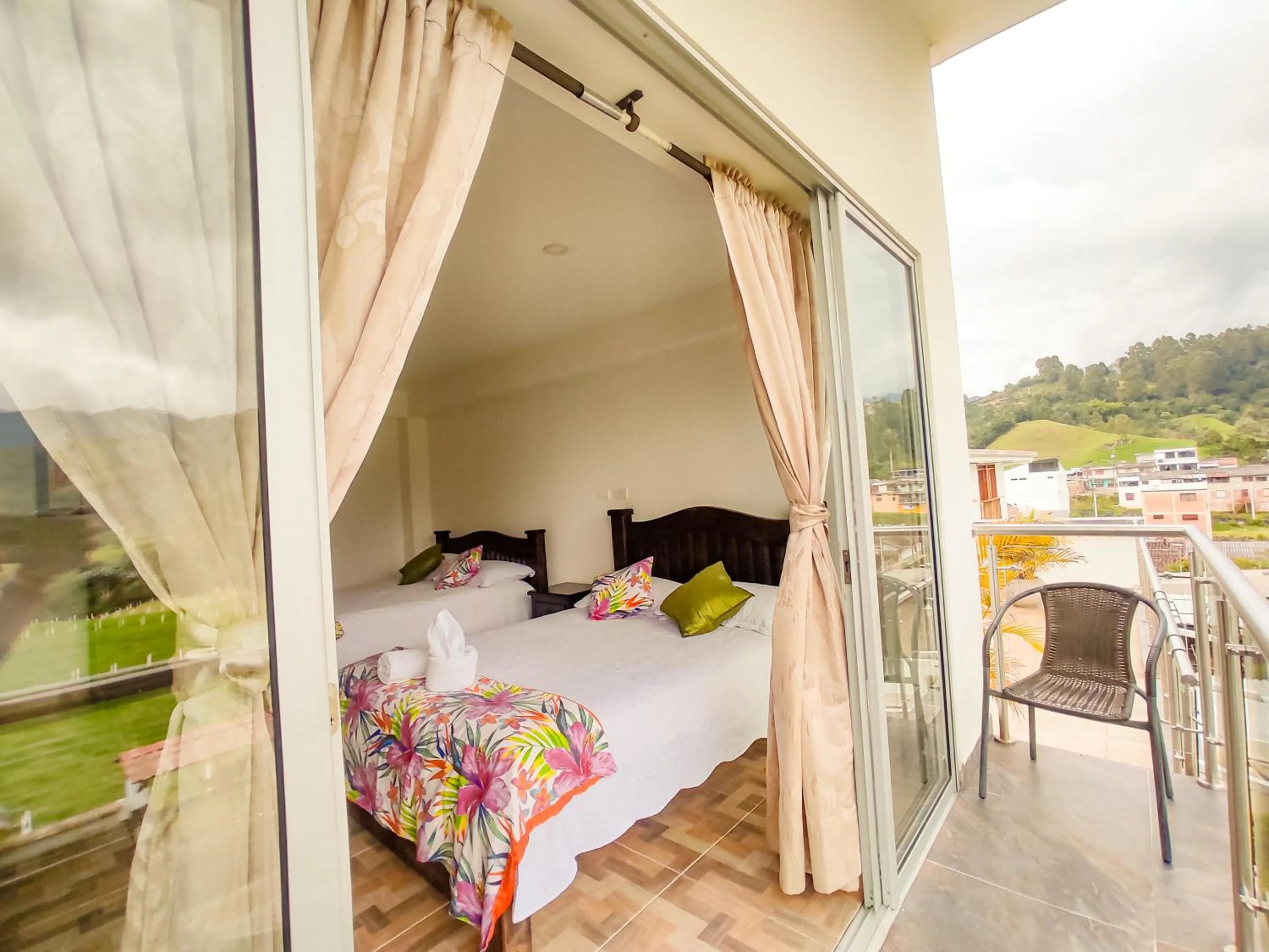 Photo of the whole room, Bed in Hotel Boutique Palmas de Salento