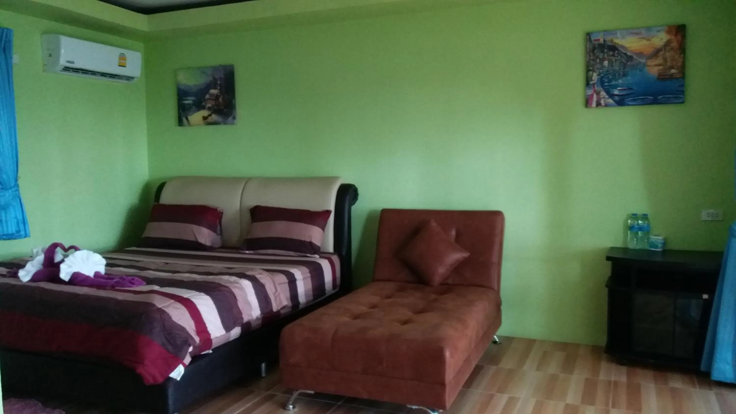 Bed in Phayam Coconut Beach Resort