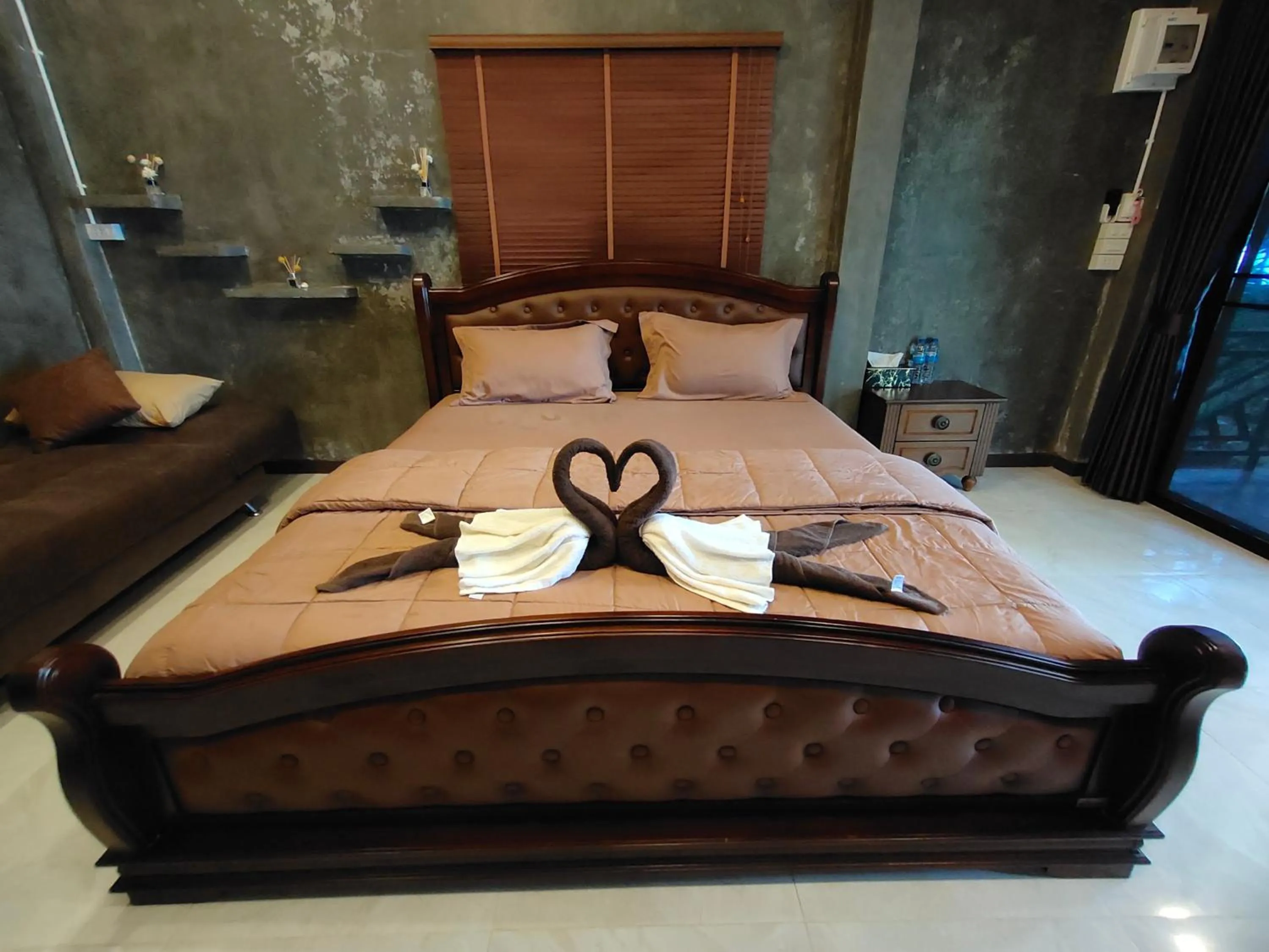 Bed in Phayam Coconut Beach Resort