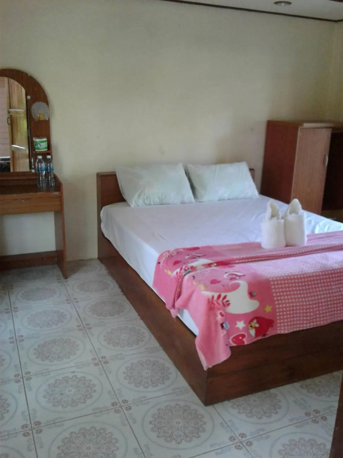 Bed in Phayam Coconut Beach Resort