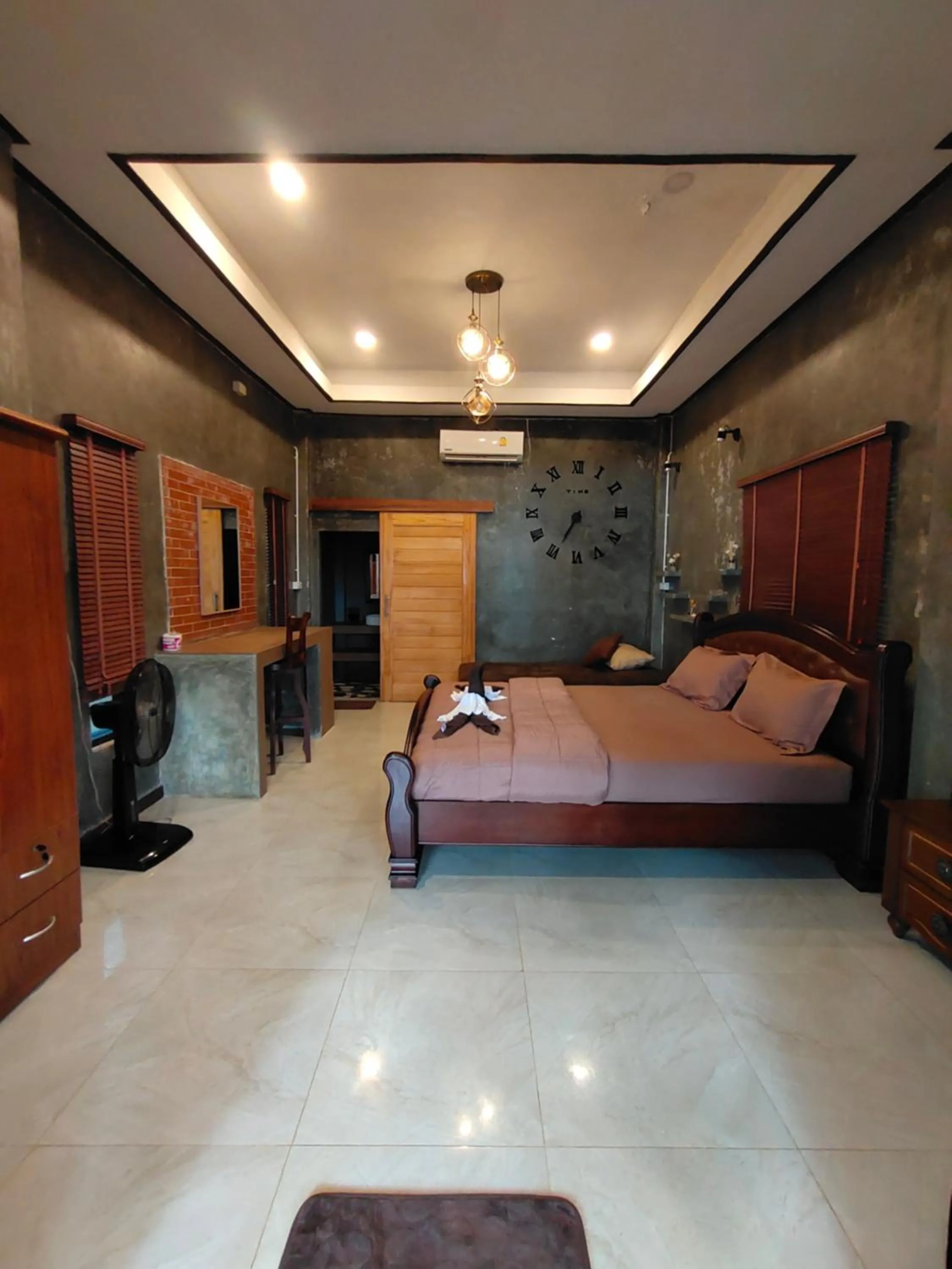 Bed in Phayam Coconut Beach Resort