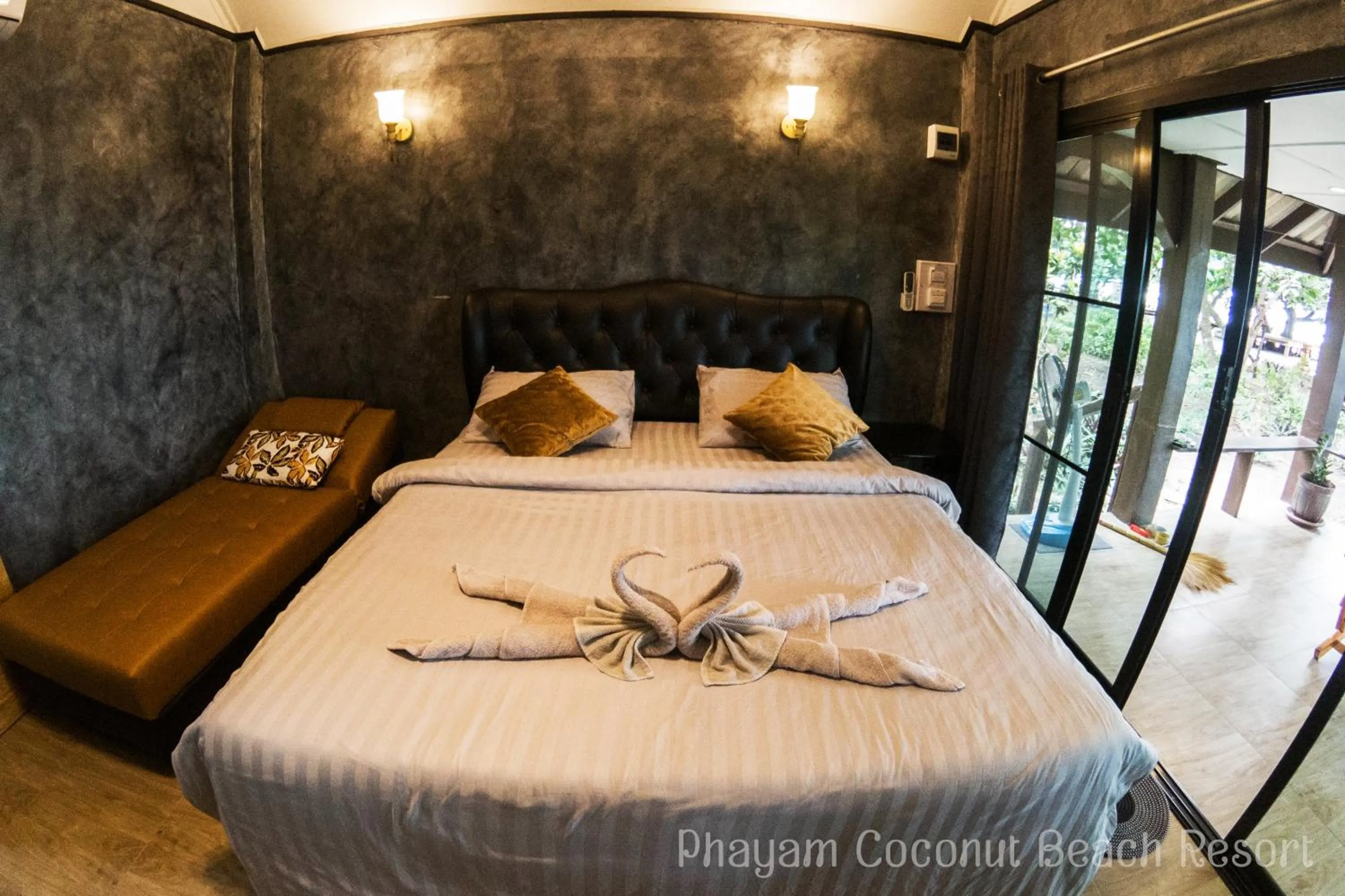 Bed in Phayam Coconut Beach Resort