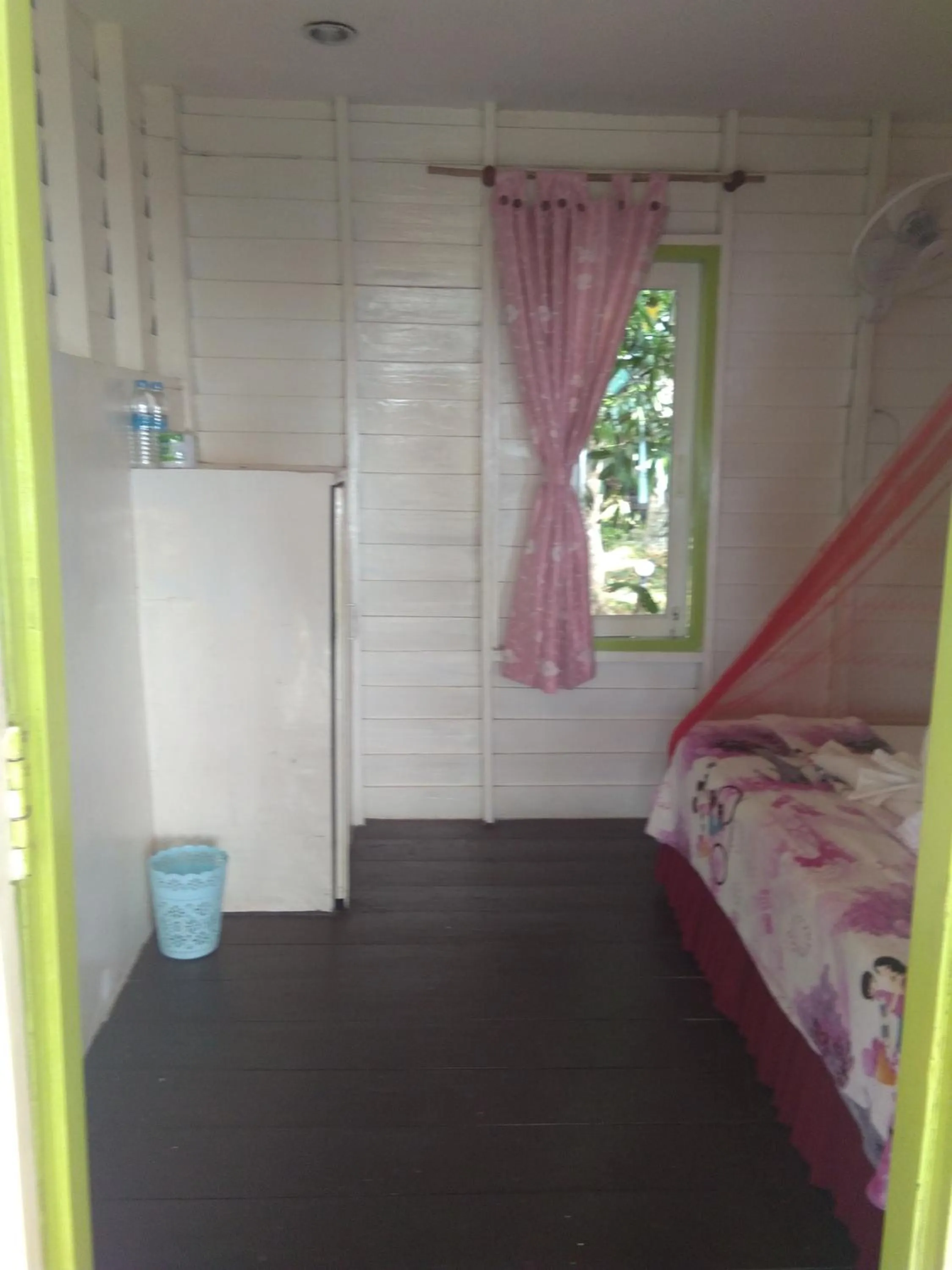 Bed in Phayam Coconut Beach Resort