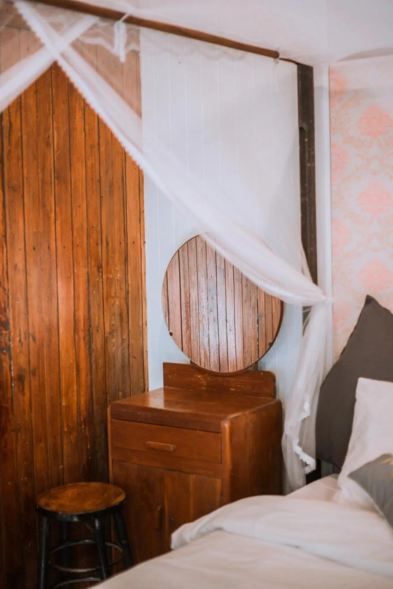 Bed in The Antique Riverside Resort